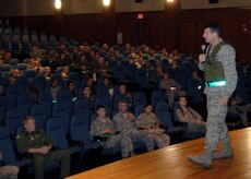 Col. Joseph Mancy briefs Charleston's deploying operational readiness inspection members at the base theater July 30 one last time before the ORI begins. The ORI will start Aug. 3 and send Charleston's Airmen to a simulated air base in East Asia. Colonel Mancy is the 437th Operations Group commander. (U.S. Air Force photo/Airman 1st Class Timothy Taylor)