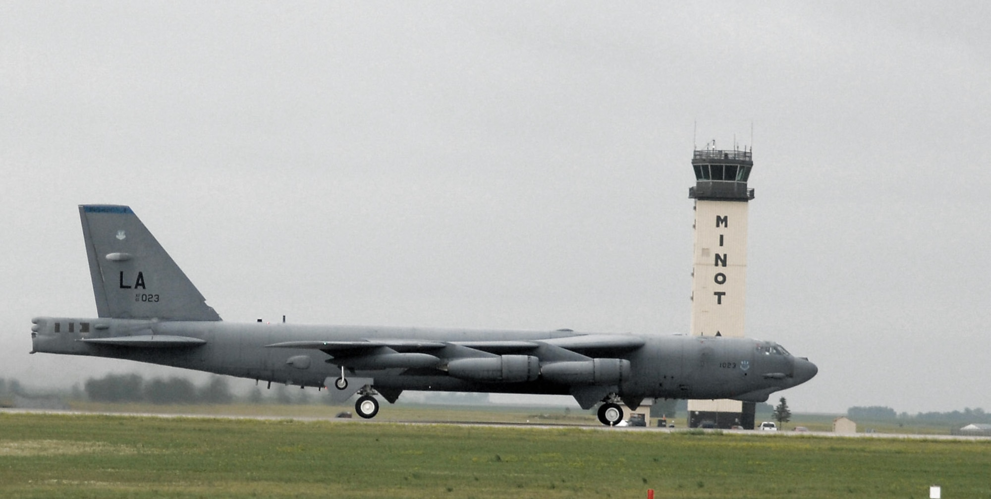 A B-52H Stratofortress from the 2nd Bomb Wing at Barksdale Air Force Base, La., takes off from Minot AFB, N.D., July 24 on its final flight to Davis-Monthan AFB, Ariz. This is the first B-52H to be retired after more than 45 years of dedicated service to the United States and the Air Force. (U.S. Air Force photo/Senior Airman Cassandra Jones) 
