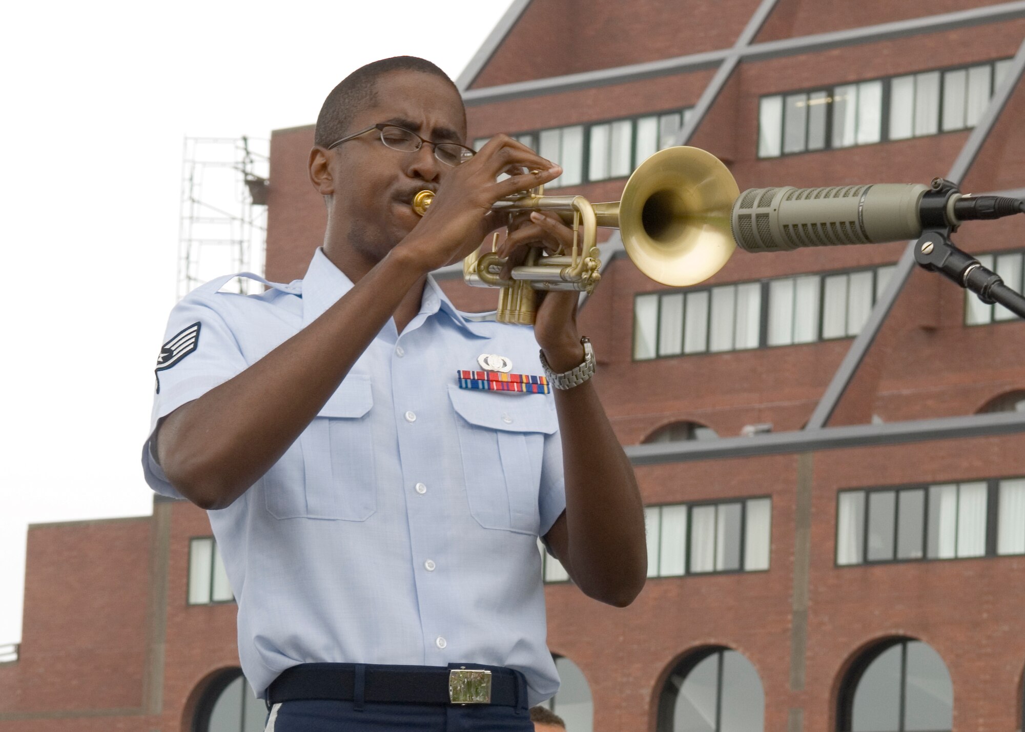SSgt Quincy Garner takes a solo in "The Brotherhood of Man" at Boston's Christopher Columbus Park. (photo by Roderick Berry)