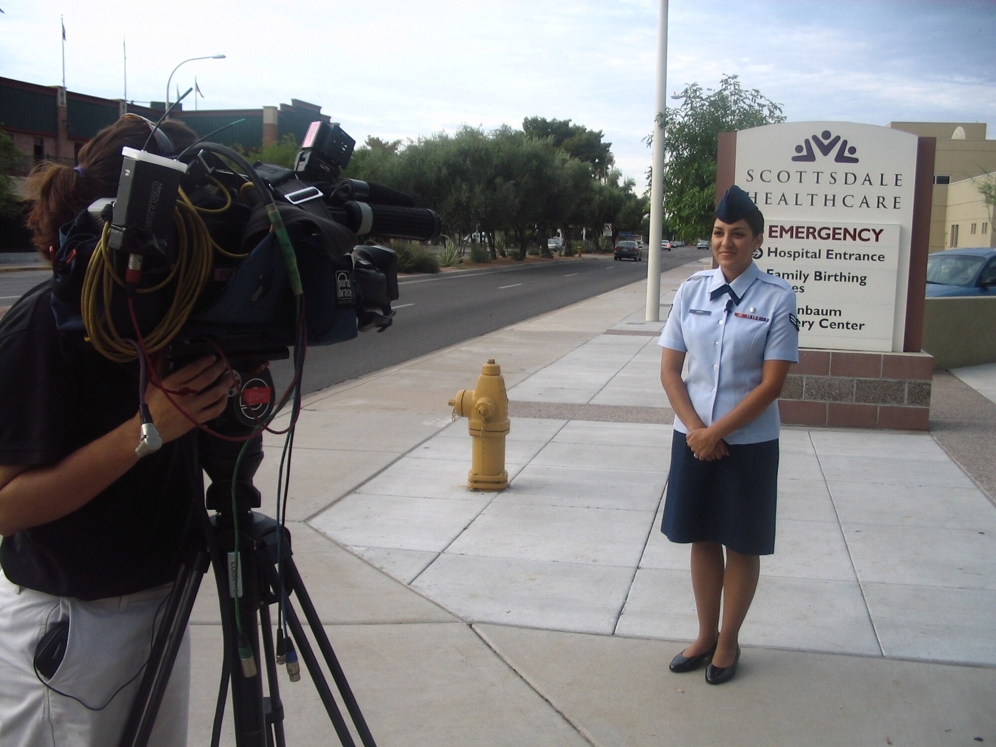 Airman 1st Class Heather Serra, 56th Medical Operations Squadron Aerospace Medicine technician is interviewed by KPNX 12 NBC Monday about the Readiness Skills Sustainment Training which she has undergone with Scottsdale Healthcare. The partnering program is to assist members of the 56th MDG and Scottsdale Healthcare in sustaining medical trauma training and provides military medical personnel with inpatient and wartime skills prior to deployments. (U.S. Air Force photo by Tech. Sgt. Janet Haliburton)