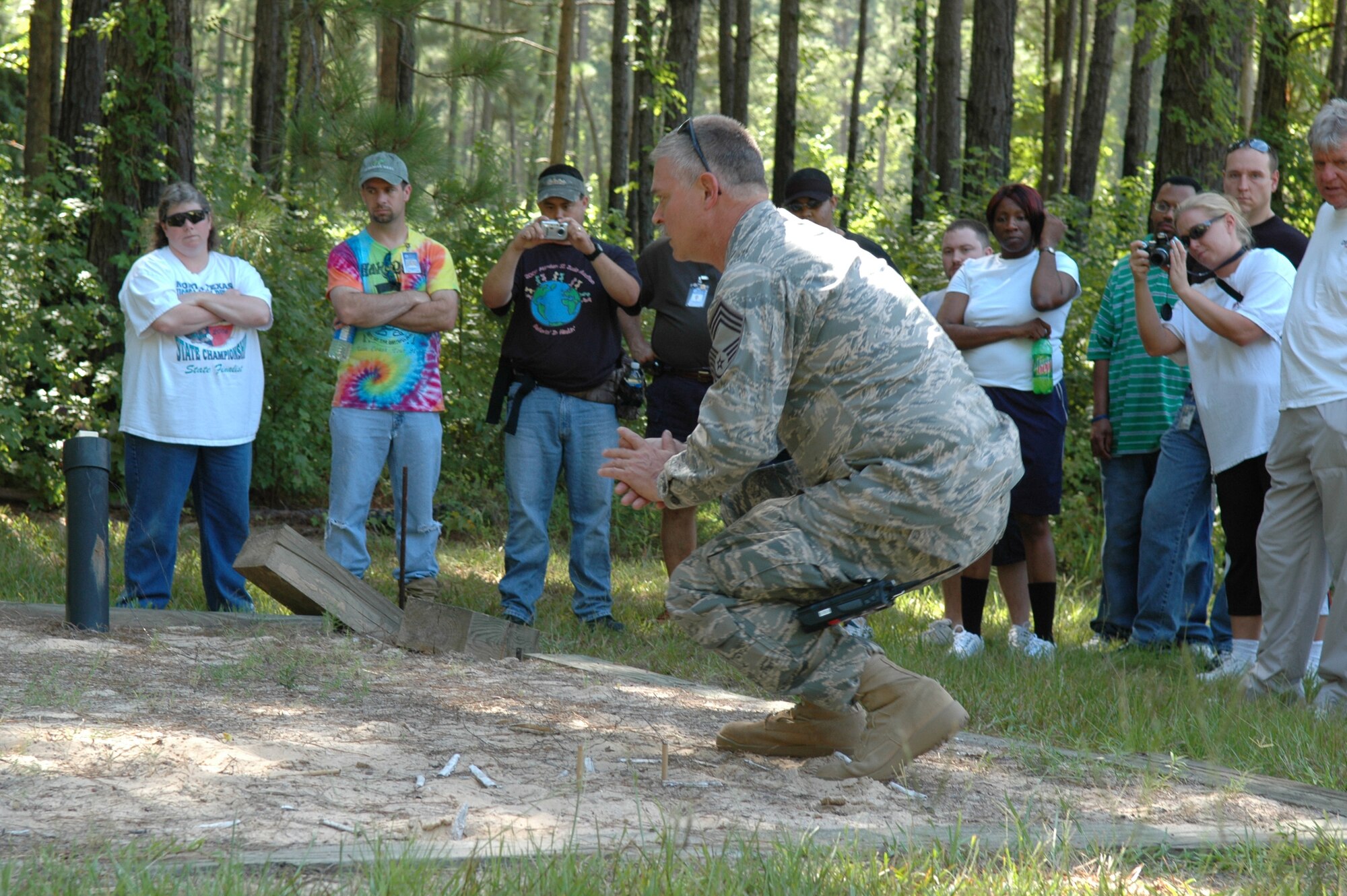 Explosive Ordnance Disposal member set explosive to detonate.