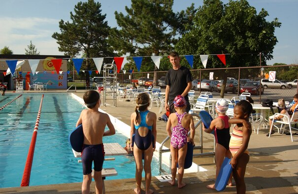 SCOTT AIR FORCE BASE, Ill. -- Airman Greca instructs his students enrolled in the base swimming lessons for children 8 years old and under about using the floatation device at the James Gym pool.
(US Air Force photo/Airman 1st Class Amber Kelly-Woodward)
