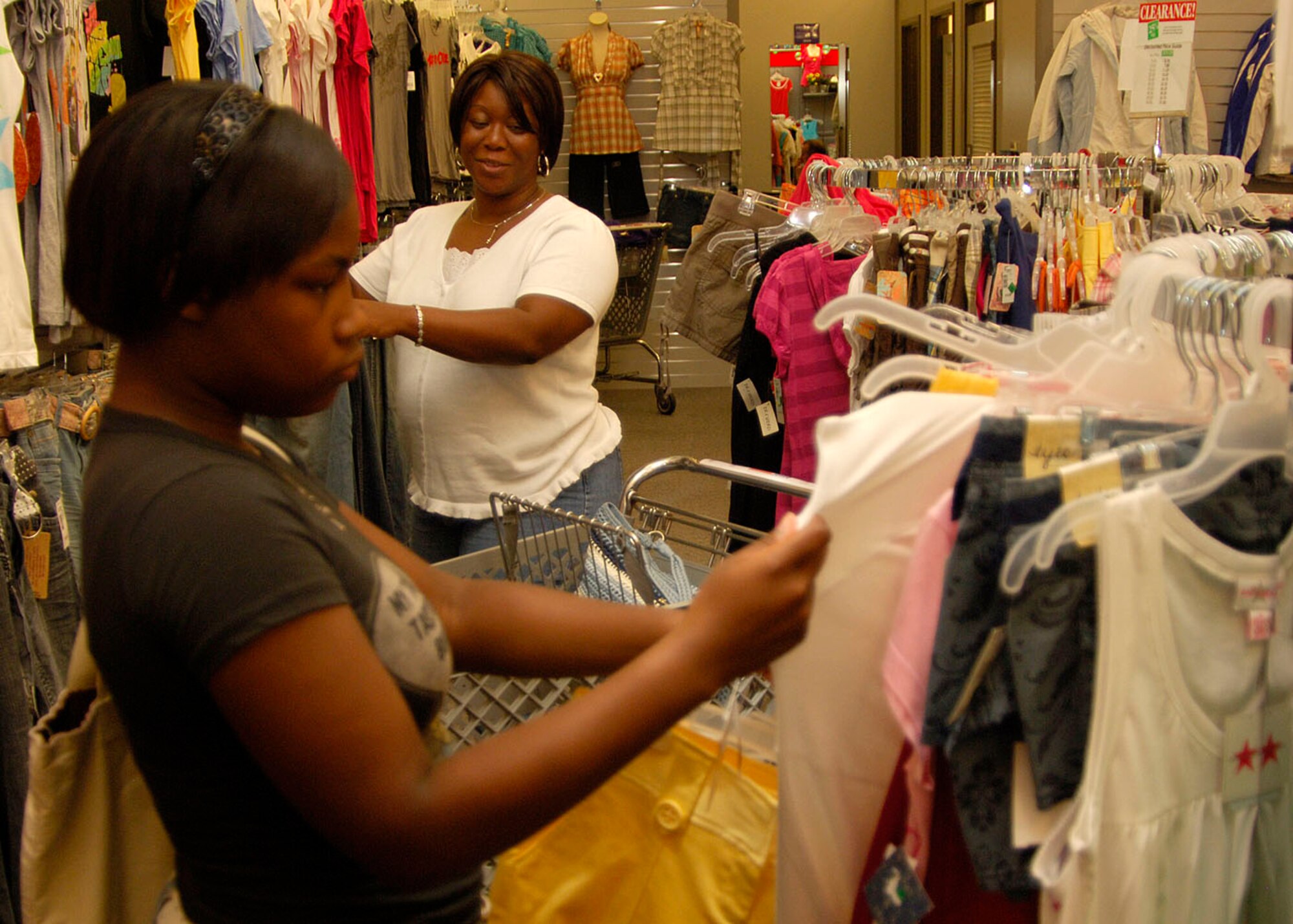SCOTT AIR FORCE BASE, Ill. -- Master Sgt. (Ret.) Lisa Brown and her daughter Jelissa Buck prepare for the upcoming school year by shopping for clothes in the Base Exchange. 
(US Air Force photo/Airman 1st Class Wesley Farnsworth)
