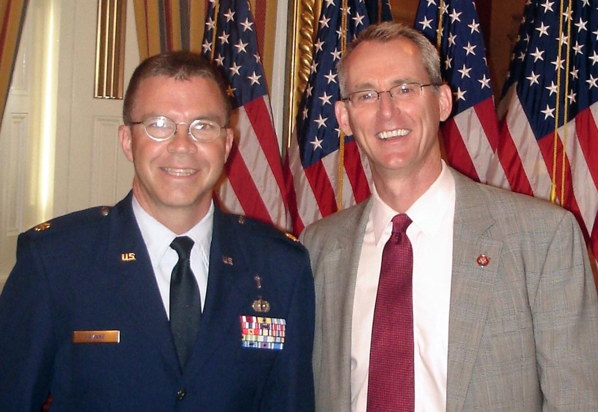 Chaplain (Maj.) Matt Franke (left) delivered the invocation July 10 to begin a new legislative day in the U.S. House of Representatives.  Chaplain Franke serves as a legislative fellow in the office of Rep. Bob Inglis of South Carolina (right).  (U.S. Air Force photo)

 
