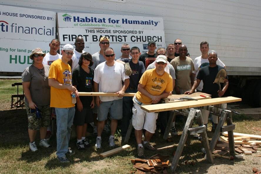 SEYMOUR JOHNSON AIR FORCE BASE, N.C. -- During the 916th Communications Squadron's annual tour this July, reservists from the squadron donated their time to a worthy cause. More than 20 reservists helped Habitat for Humanity on Sat. July 19. The communicators helped landscape, build trusses, fortify walls, install installation and build shelves during their volunteer day. The project took place near the base located in Goldsboro, N.C.