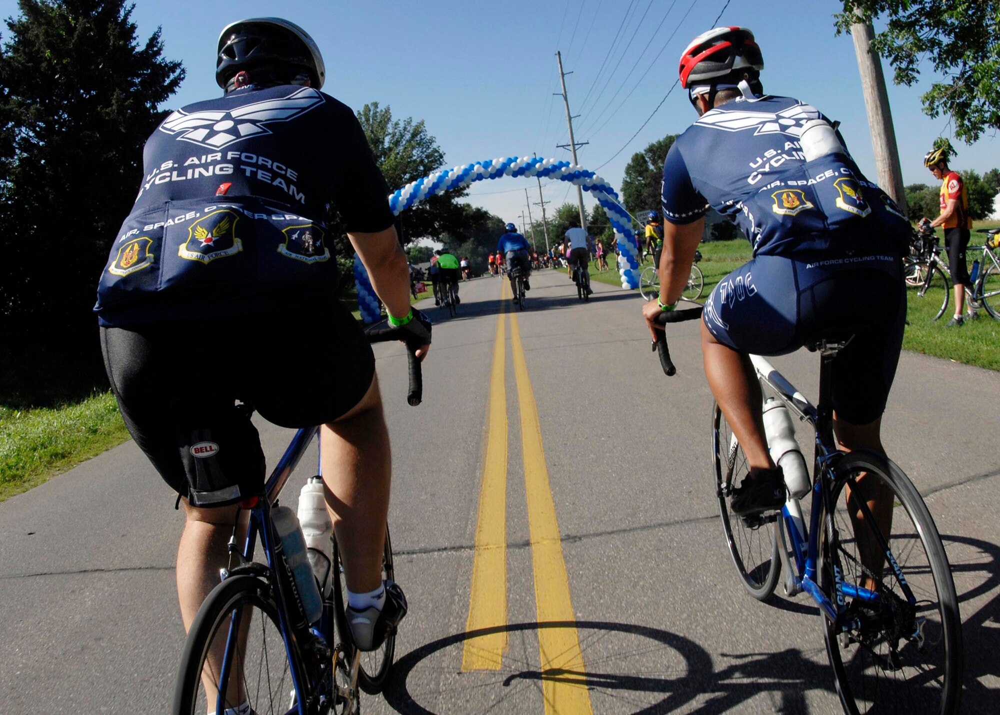 OGDEN, Iowa - Members of the Barksdale Cycling Team ride into Ogden, July 22 on their way from Jefferson, to Ames. Members of the AFCT have been participating in the RAGBRAI for the past 14 years to promote recruiting and fit to fight. Members of the AFCT have been participating in the RAGBRAI for the past 14 years to promote recruiting and fit to fight. (U.S. Air Force photo by Airman 1st Class Joanna M. Kresge)