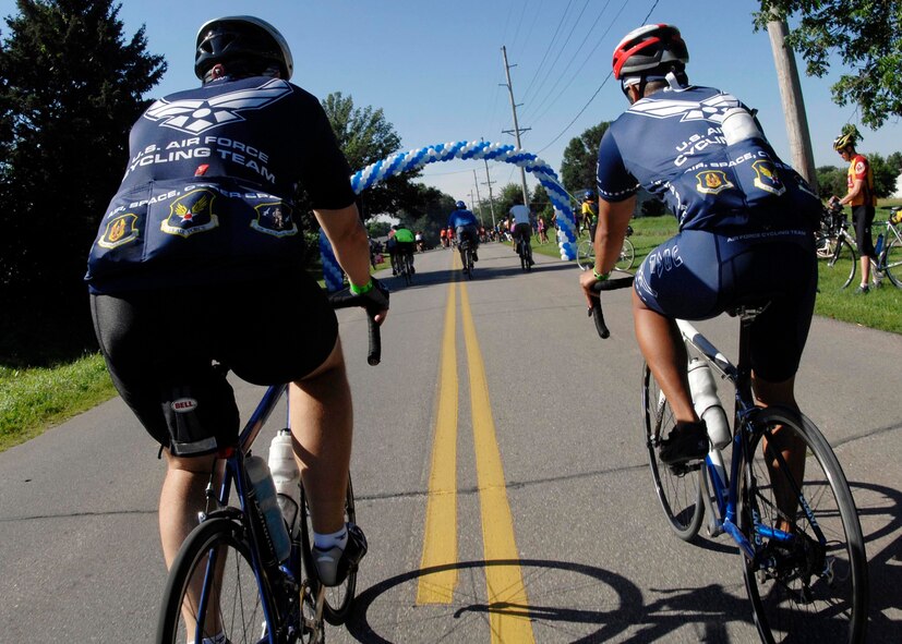 OGDEN, Iowa - Members of the Barksdale Cycling Team ride into Ogden, July 22 on their way from Jefferson, to Ames. Members of the AFCT have been participating in the RAGBRAI for the past 14 years to promote recruiting and fit to fight. Members of the AFCT have been participating in the RAGBRAI for the past 14 years to promote recruiting and fit to fight. (U.S. Air Force photo by Airman 1st Class Joanna M. Kresge)