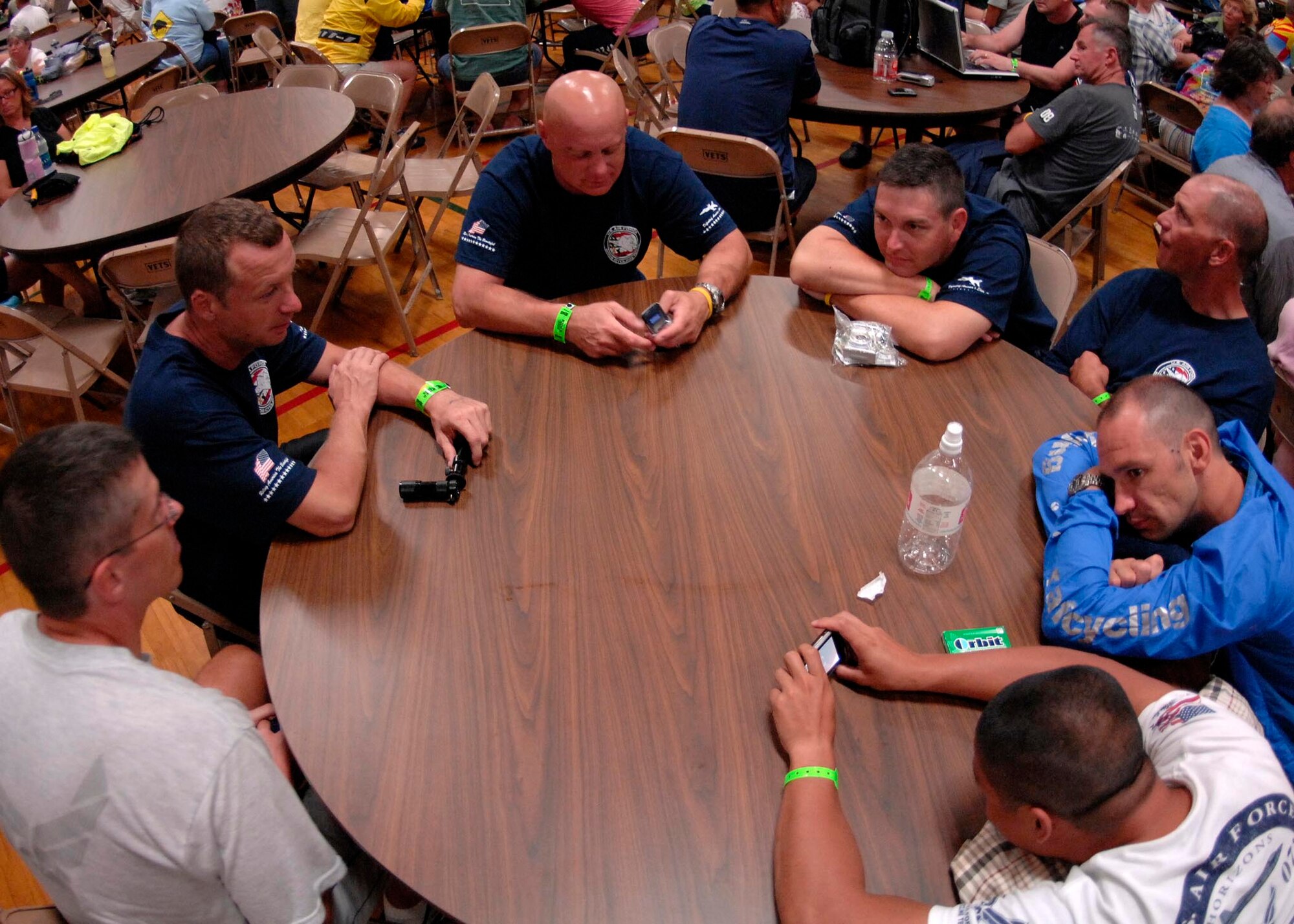 HARLAN, Iowa - Members of the Barksdale Cycling Team wait out a storm in a shelter in the middle of the night after the first day of the Registers Annual Great Bike Ride Across Iowa, July 20. The Air Force Cycling Team is participating in the RAGBRAI for the 14th year in effort to maintain fight to fight and participate in Air Force Recruiting. (U.S. Air Force photo by Airman 1st Class Joanna M. Kresge)