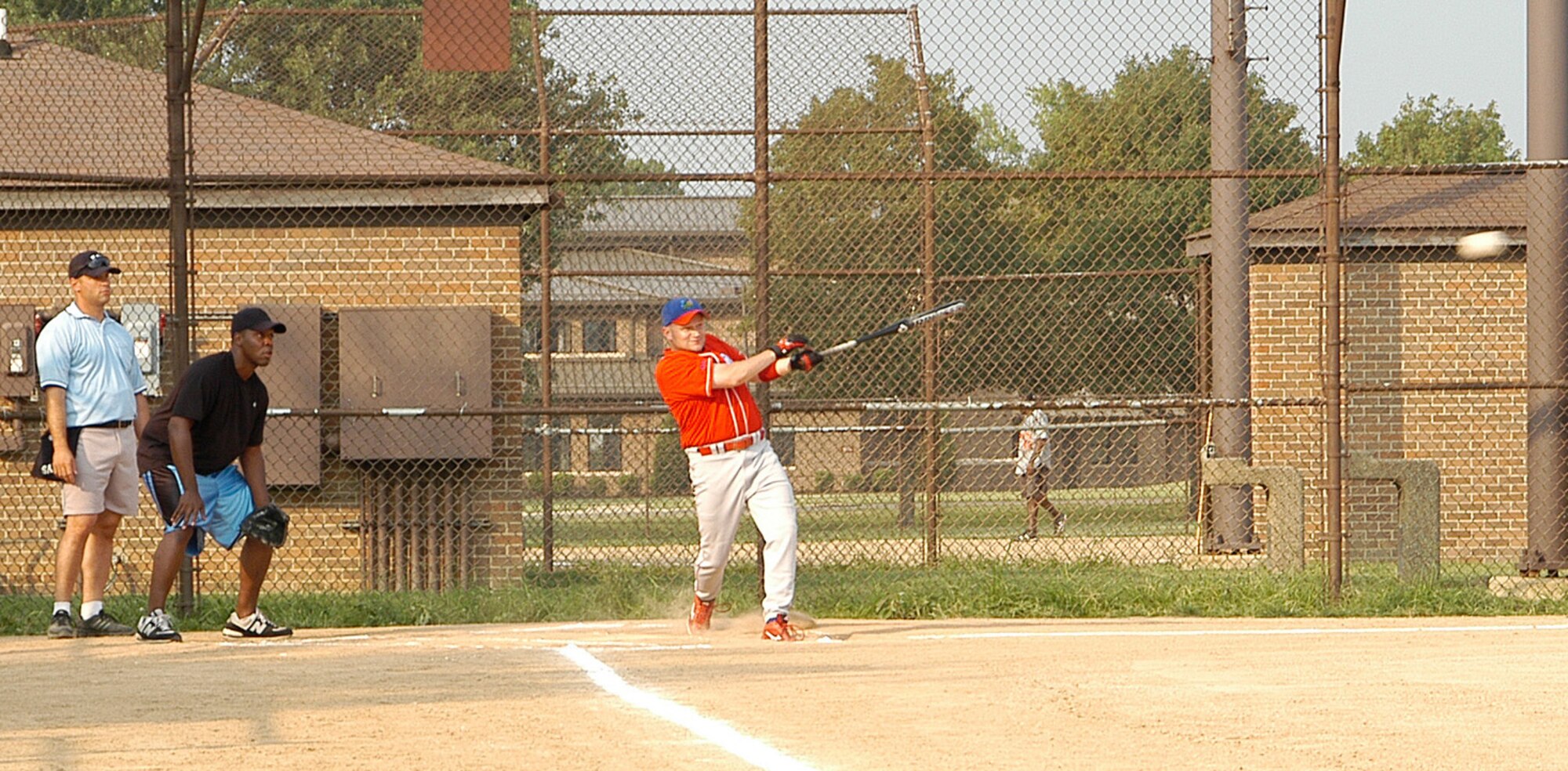 AFOSI Gators’ Spence Rogers rips a line drive up the middle in a 9-1 rout of the 79th Medical Group in the first game of a doubleheader. The 79th Med Group also fell victim to the Gators’ ways 18-3 in the second game. (U.S. Air Force photo/Tech. Sgt John Jung)