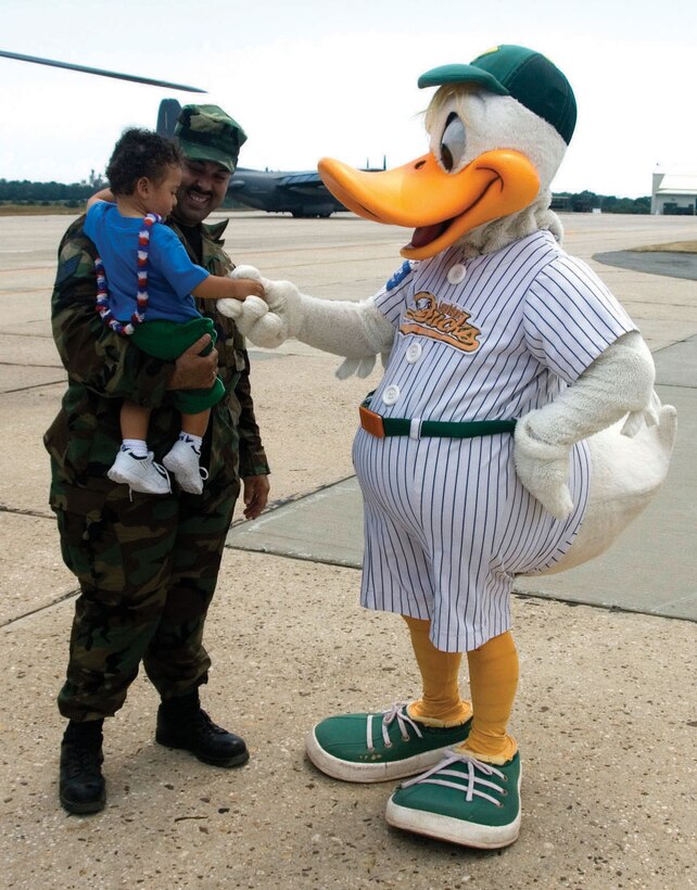F.S. Gabreski Airport, Westhampton Beach, N.Y. -

The Long Island Ducks mascot, Crackerjack, shakes the hand of Kenneth Padilla, 10 months, son of Staff Sgt. Kenneth Padilla, of the 106th Medical Group during Family Day. 

The 106th Rescue Wing opened its doors to members of the community as well as its own Airmen on July 21, 2008 for Family and Community Appreciation Day. This free event included a live music, food, a classic car show, a Jell-O eating contest, custom t-shirts, popcorn, snow cones and a static display. The event was supported by volunteers from the 106th, various sponsors from the community, the Civil Air Patrol and the Friends of the 106th. 

(Official USAF photo by Staff Sgt. David J. Murphy)