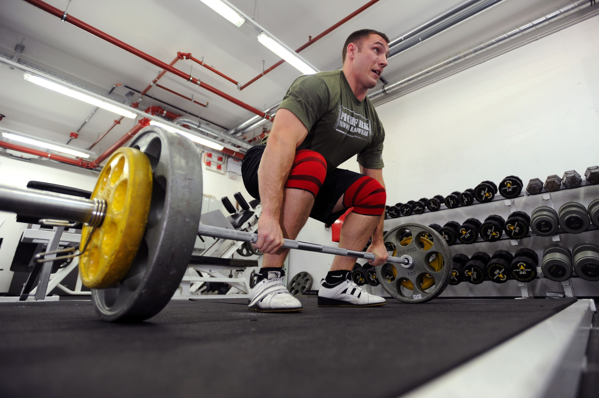 Staff Sgt. Adam Keep, 723rd Air Mobility Squadron navigation technician, begins his daily workout routine in training for his next Strongman competition July 15, 2008, Ramstein Air Base Germany. Sergeant Keep has been competing in Strongman competitions for 4 years, winning his pro card after only a year, making him eligible to compete in the pro ranks.   (U.S. Air Force photo/Airman 1st Class Kenny Holston)(RELEASED)