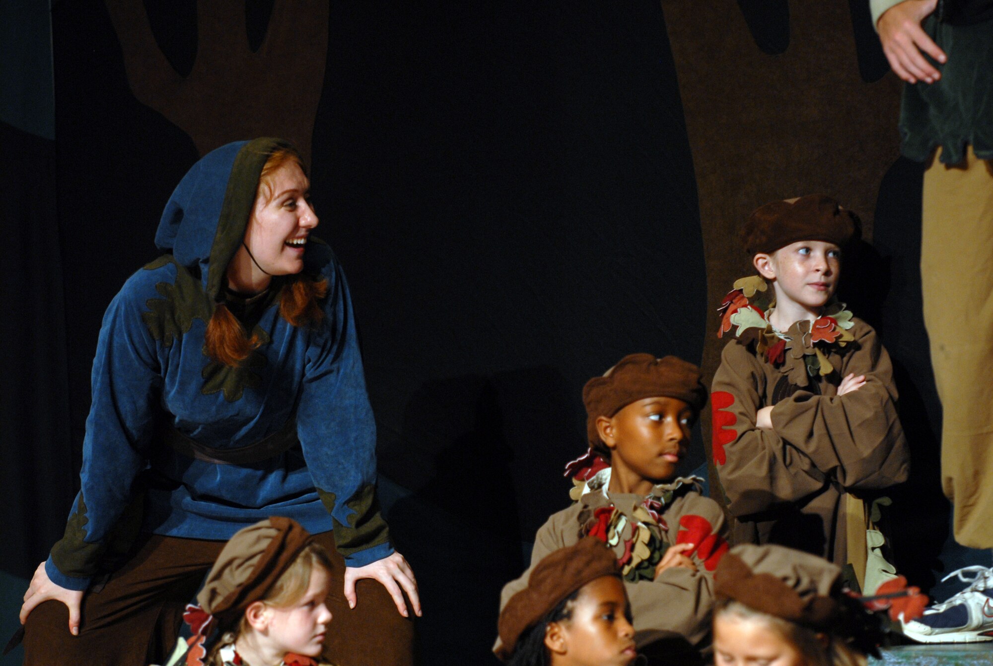 Renee Roberts, an actress with the Missoula Children's Theater plays the
part of "Sherwood" alongside youth from Kadena and surrounding U.S. bases
during dress rehearsal for the MCT presentation of "Robin Hood."  (U.S. Air
Force photo/Staff Sgt. Christopher Marasky)