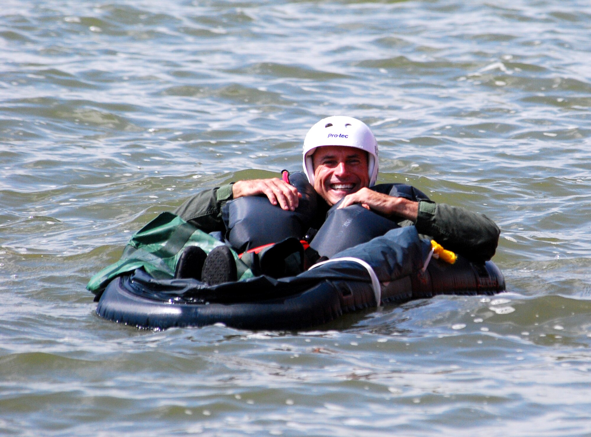Pilots from the 457th Fighter Squadron recently endured their annual water survival training conducted at Lake Worth in Fort Worth, Texas. Col. Kevin Pottinger, 301st Fighter Wing commander and F-16 pilot, enjoys a moment from training and the hot Texas weather to float in an individual raft used for pilot water safety. (U.S. Air Force Photo/Tech. Sgt. Julie Briden-Garcia)