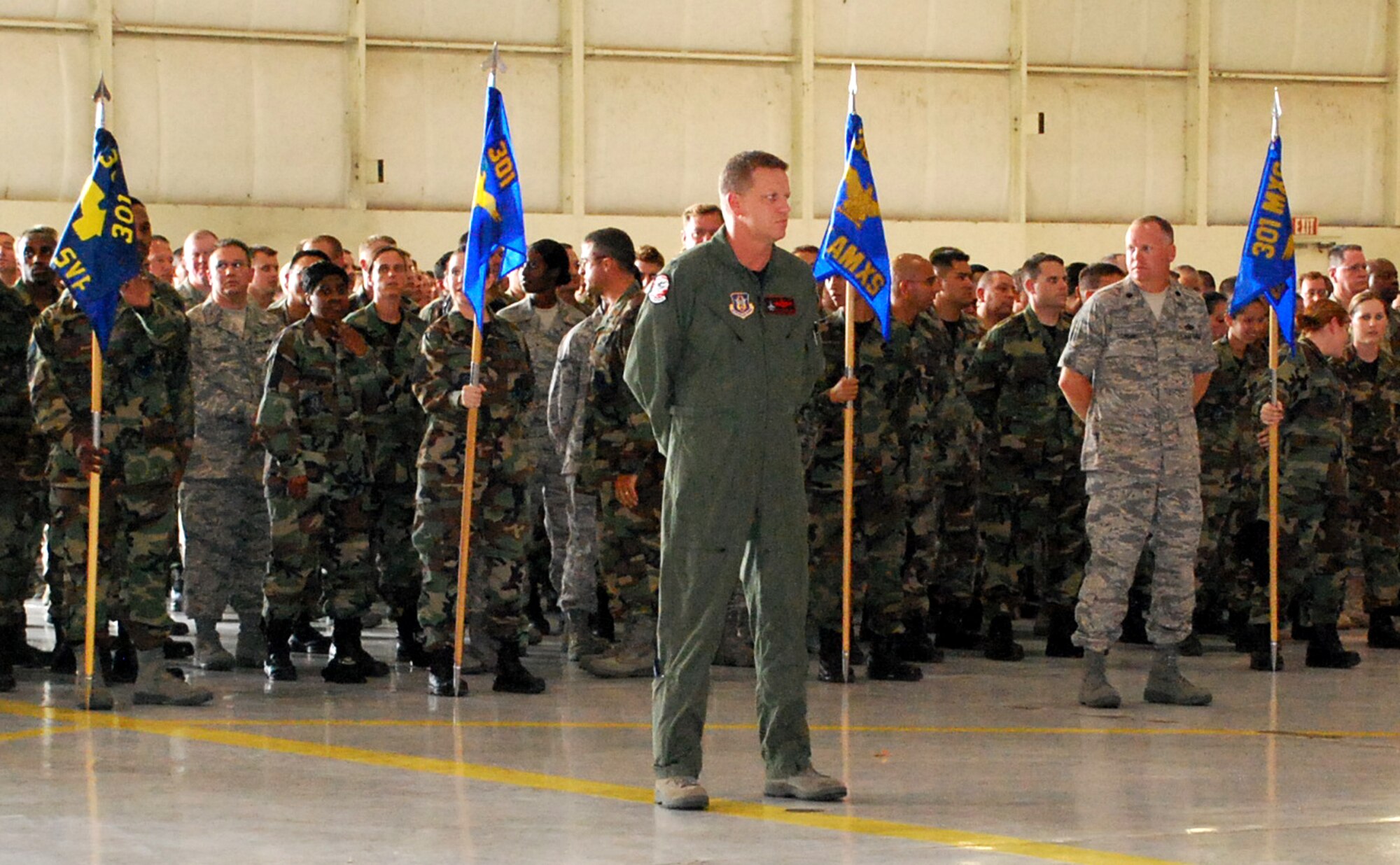 Col. Bob Mortenson, 301st Fighter Wing vice commander, stands as troop commander during a recent wing commander's call at Naval Air Station Fort Worth Joint Reserve Base Carswell Field, Texas. (U.S. Air Force Photo/Tech. Sgt. Julie Briden-Garcia)