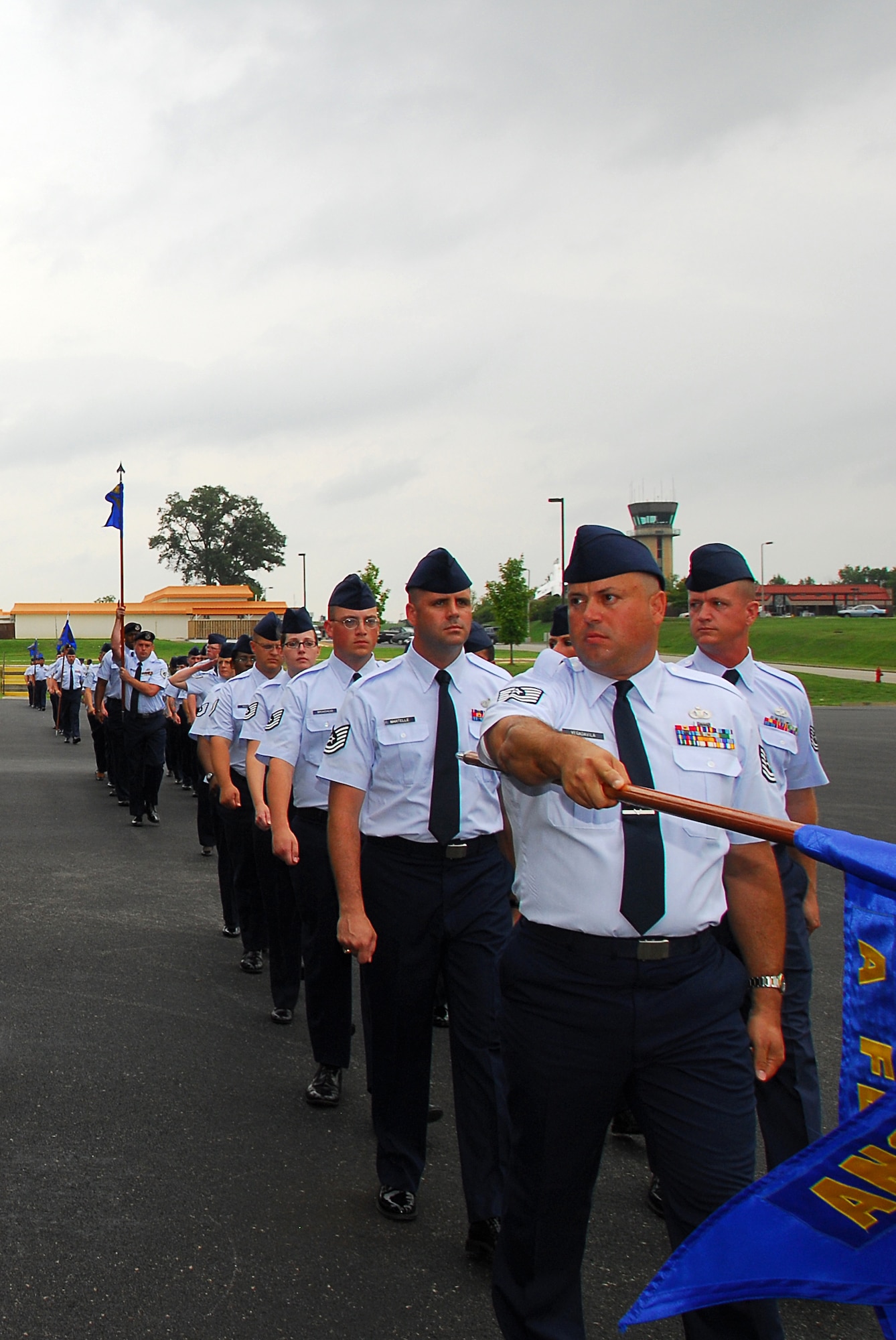 Air National Guard Noncommissioned Officer Academy students march past a grandstand at McGhee Tyson Air Guard Base, Tenn., July 31 during the 40th Anniversary celebration of the Air Guard's I.G. Brown Training and Education Center. (Photo by Air Force Tech. Sgt. Kendra Owenby, Tennessee National Guard)