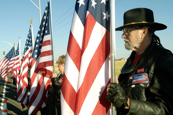 FAIRCHILD AIR FORCE BASE, Wash. – The Spokane chapter of the Veteran American Legion Riders greets members of the 92nd Air Refueling Wing as they report for duty July 25. (U.S. Air Force photo / Senior Airman Eunique Stevens)