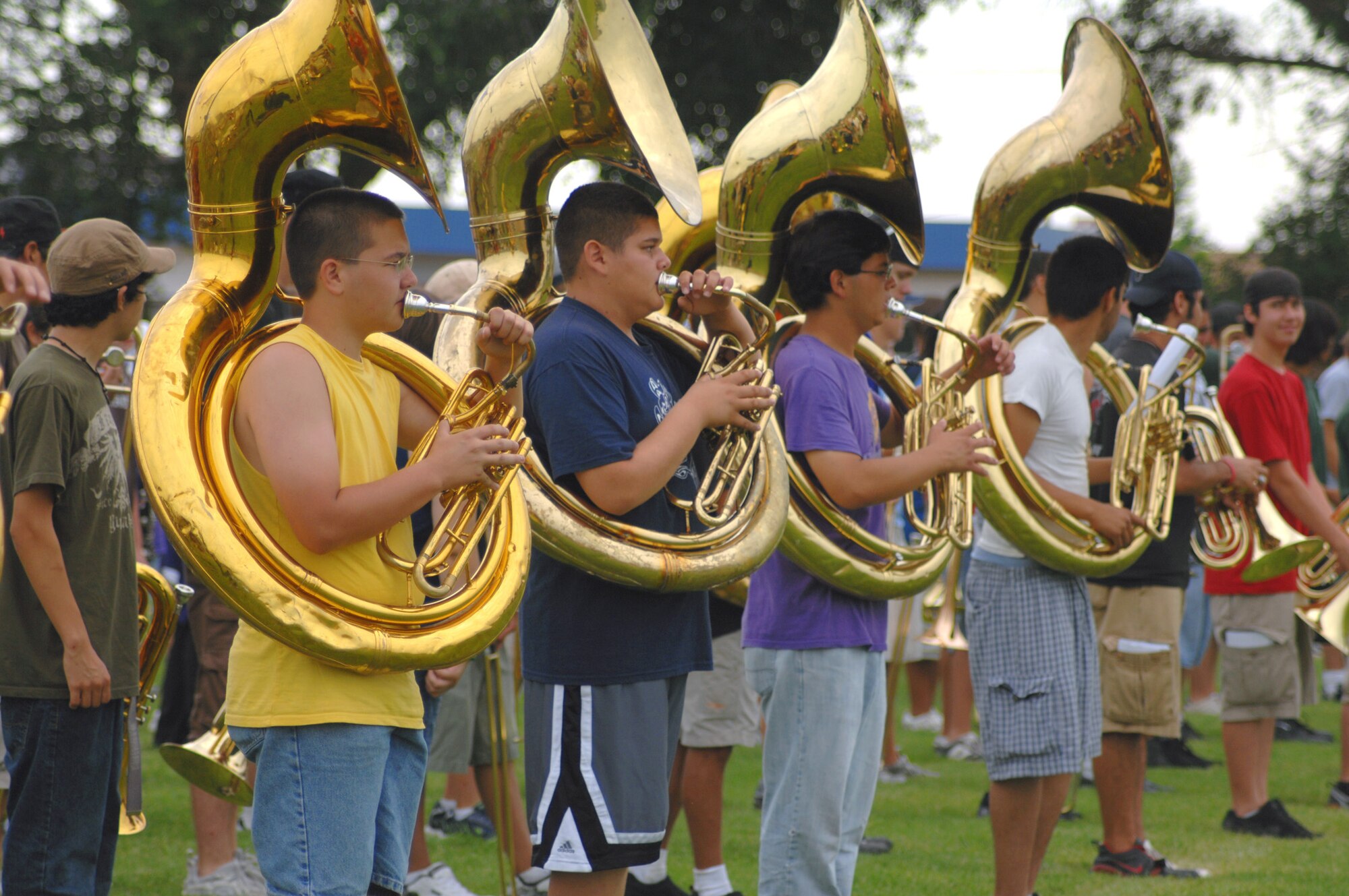 Clovis Wildcat High School tuba players practice with the rest of the band July 30. This can only mean that the new school year will soon be here. Local area schools begin Aug.18, except for kindergartners, who begin Aug. 13. Many school and clothing items are available sans sales tax in New Mexico Aug. 1-3 as well as in Texas, Aug. 15-17. The Cannon Base Exchange will take an additional eight percent off items on New Mexico's tax-free items list from Aug 1-3. (Air Force photo by Greg Allen)