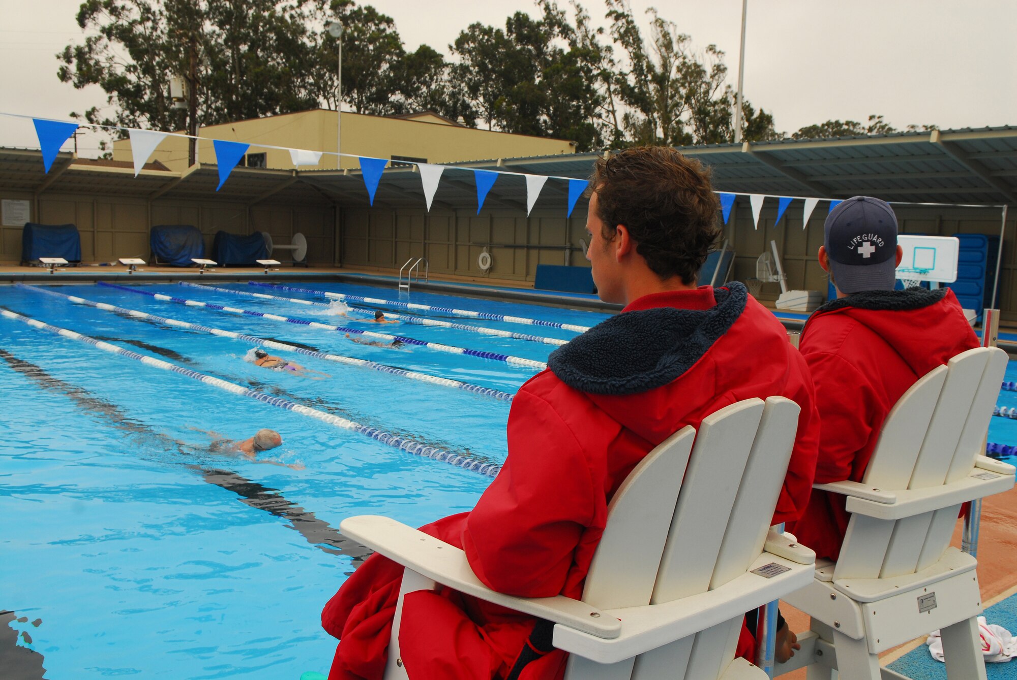 VANDENBERG AIR FORCE BASE, Calif. --  Lifeguards from the 30th Force Protection Squadron keep an eye on swimmers at the base pool on Monday.  (U.S. Air Force photo/Senior Airman Trey Lewis)