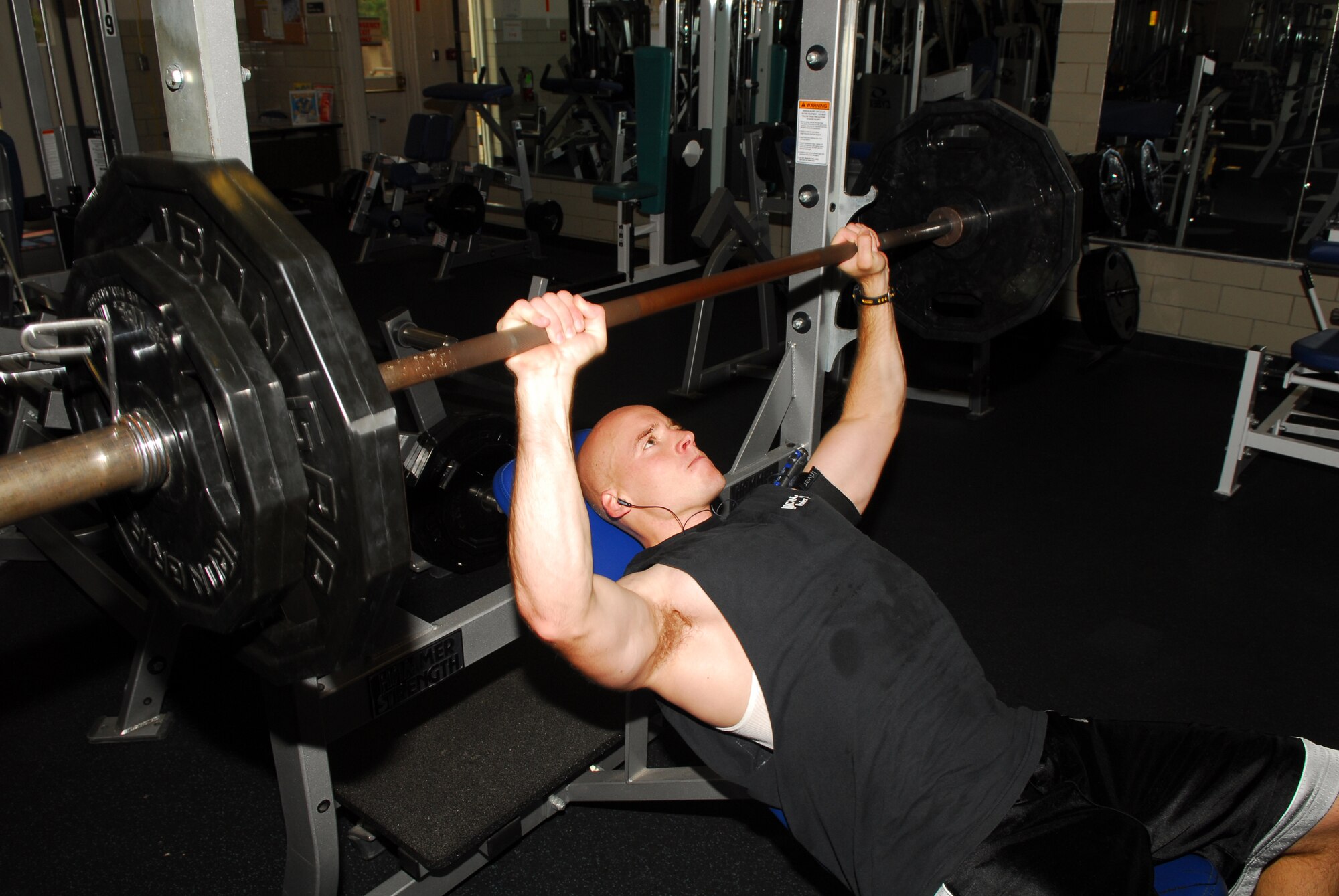 VANDENBERG AIR FORCE BASE, Calif. --  Second Lt. Jamie Douglas, 392nd Training Squadron, lifts weights to enhance his war fighting capabilities on Monday.  (U.S. Air Force photo / Senior Airman Trey Lewis)