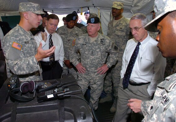 First Lt. Michael Malloy, left, of the National Guard's Joint Communication, Command, Control and Computer Coordination Center in Smyrna, Del., briefs Paul McHale, assistant secretary of defense for homeland defense; LTG H Steven Blum, the chief of the National Guard Bureau; and Deputy Secretary of Defense Gordon England at the Pentagon on July 25, 2008, about the National Guard's Joint Incident Site Communications Capability. Deployed in all 54 states and territories by the National Guard Bureau, JISCC is a communications bridge between first responders and other local, state and federal agencies that can provide initial communications capability within one hour after arrival at an incident scene. (U.S. Army photo by Staff Sgt. Jim Greenhill) (Released)