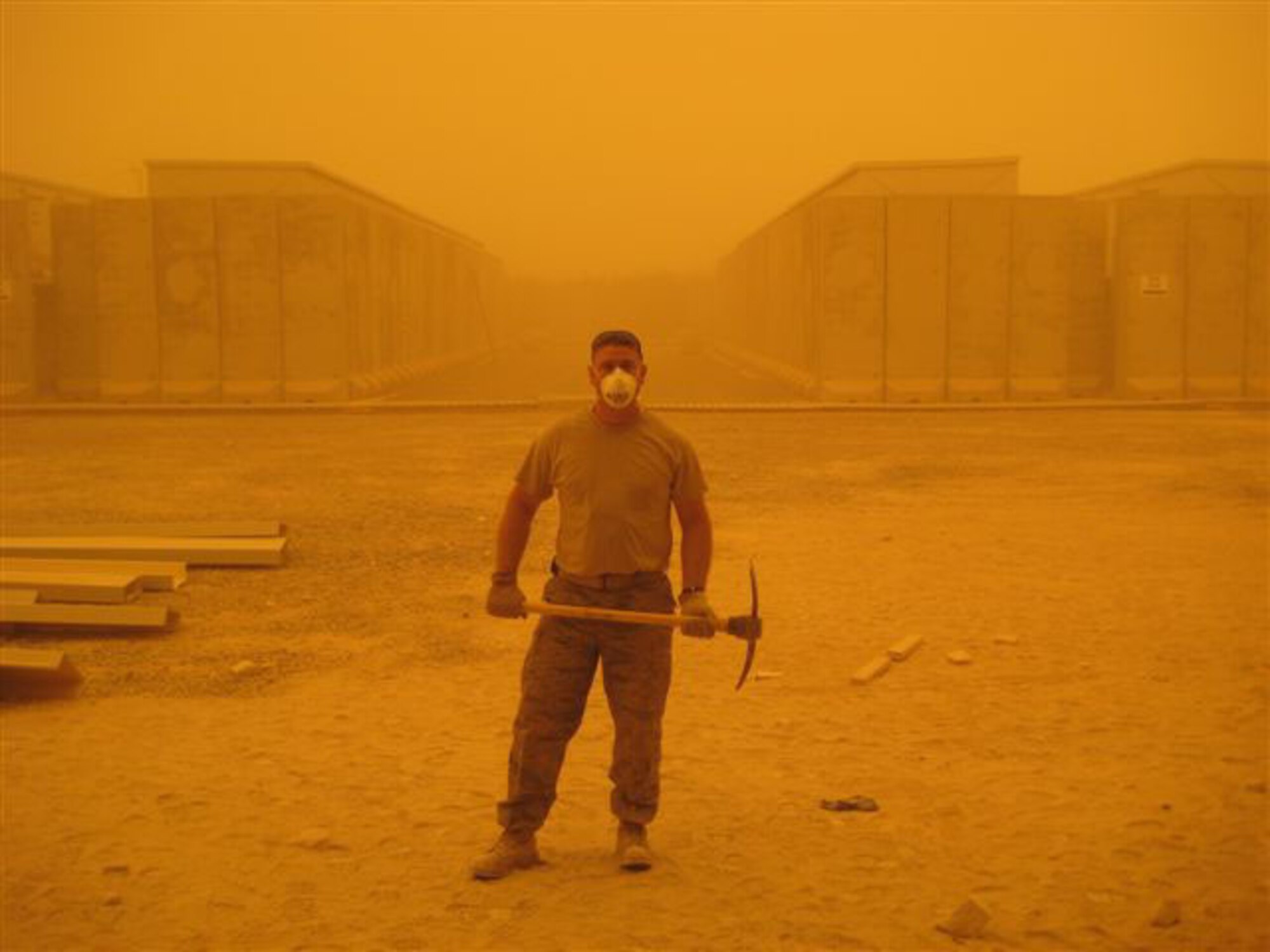 SEYMOUR JOHNSON AIR FORCE BASE, N.C. -- Senior Airman John Long, a heavy equipment operator with the 916th Civil Engineer Squadron, prepares to do some digging while deployed to Baghdad International Airport, Iraq. Airman Long is one of more than a dozen Air Force Reserve engineers deployed from the 916th Air Refueling Wing.