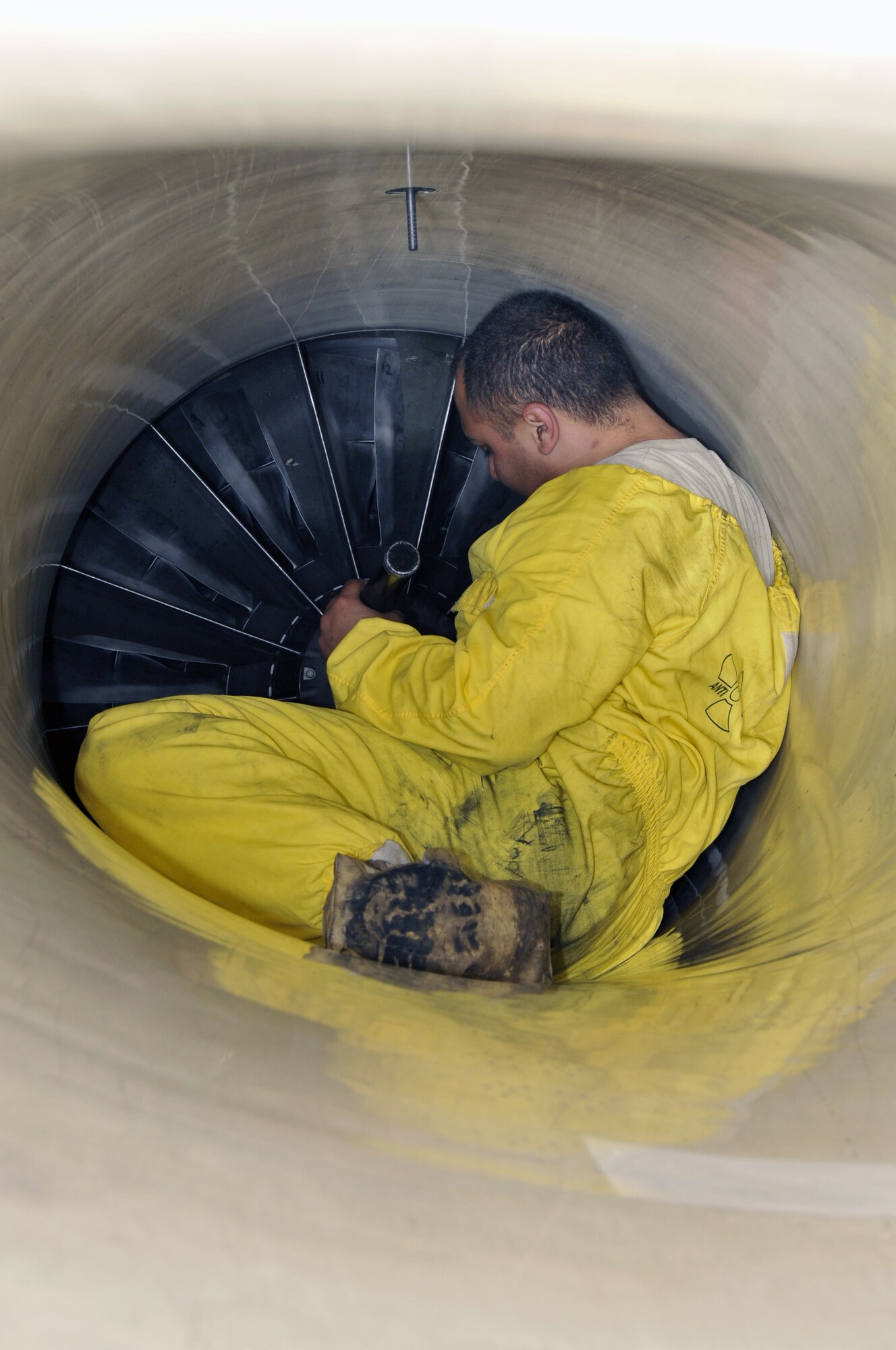 Senior Airman Jorge Villasenor, 52nd Aircraft Maintence Squadron crew chief peforms an intake inspection on an F-16CJ from the 23rd Fighter Squadron July 24 at RAF Lakenheath, England. The crew chiefs were maintaining jets that were part of the Operation Northern Fury exercise, which included aircraft from RAF Lakenheath, Spangdahlem Air Base and Aviano Air Base. (U.S. Air Force photo by Airman Perry Aston) 