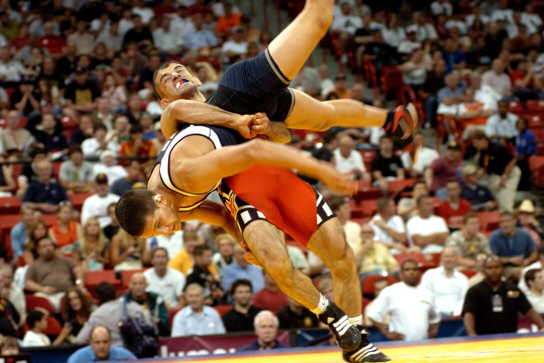 U.S. Army World Class Athlete Program Spc. Faruk Sahin throws Minnesota Storm's Jake Deitchler during the 66-kilogram Greco-Roman finals of the 2008 U.S. Olympic Team Trials for Wrestling June 14, 2008, at the University of Nevada Las Vegas' Thomas & Mack Center. Deitchler won the best-of-three series, 2-3, 7-5, 3-0. 
