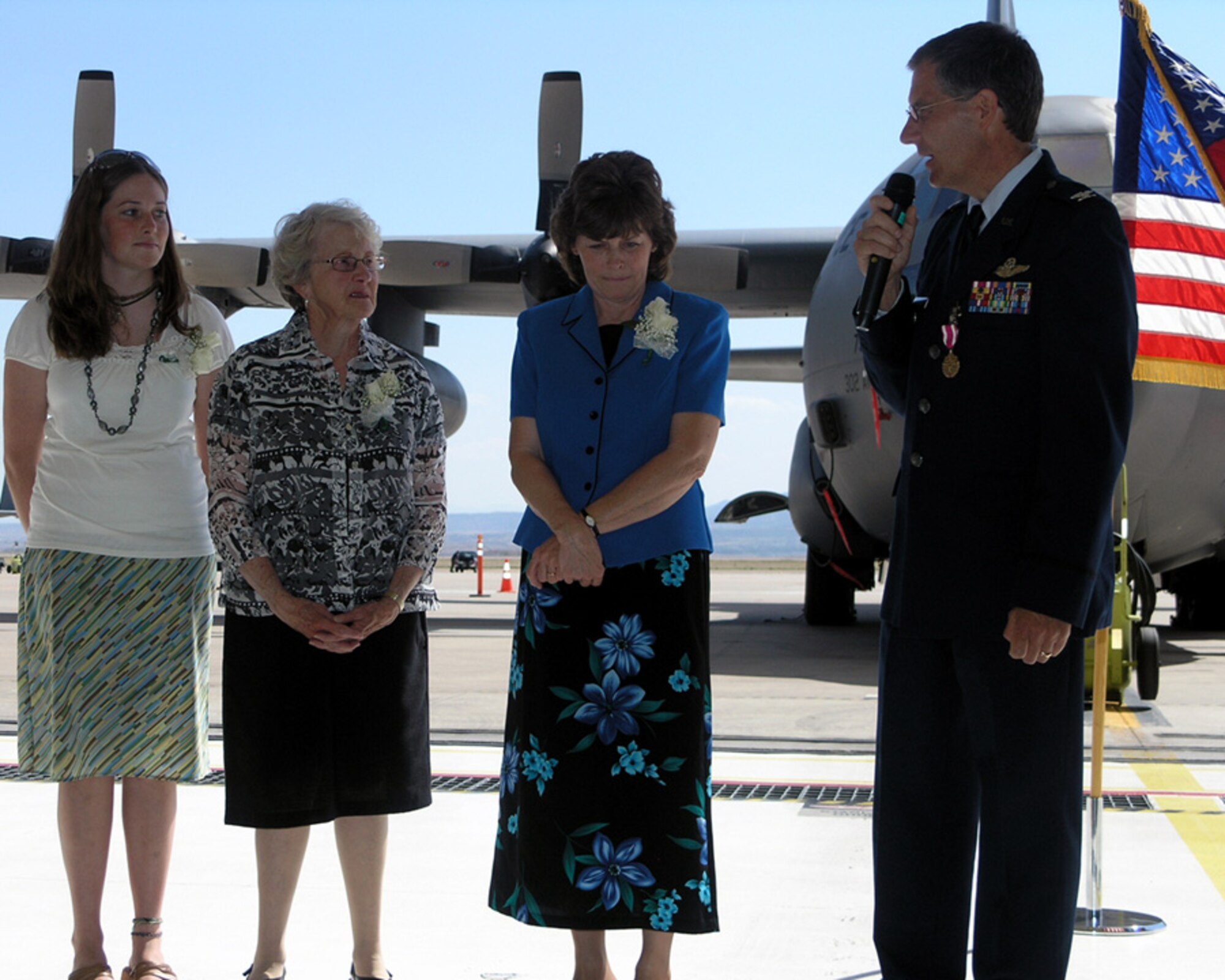 Col. Andy T. McMahon presents his immediate family members at his retierment ceremony 31 May with a special thanks for their years of dedication and support with his service in the Air Force Reserves and over 5000 flight hours.  Col. McMahon served as the vice-commander for the 302nd Airlift Wing at Peterson Air Force Base, Colo., from 2005 till Dec 2007. (U.S. Air Force Photo by/ Tech. Sgt. David Morton.)