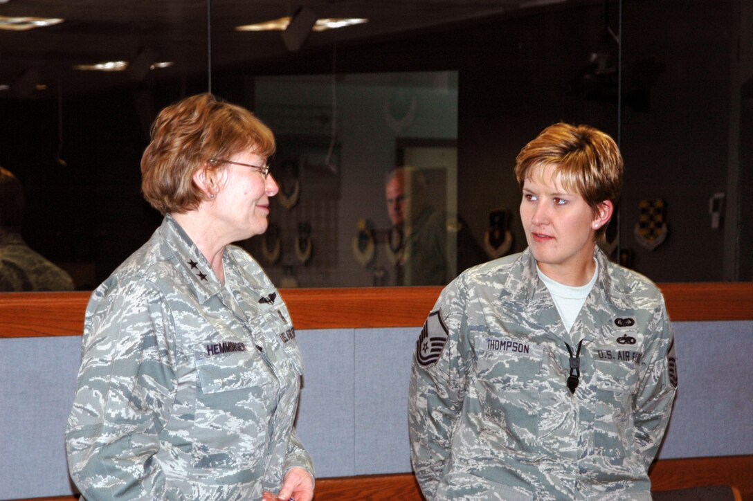 Maj. Gen. Linda S. Hemminger gives a personal thank you to Master Sgt. Candi R. Thompson for spearheading HRDC development and training for reserve members along the Front Range of Colorado. Members of the Pikes Peak HRDC joined together on 22 May at Peterson Air Force Base to discuss the current issues effecting reservists, IMAs and civilian personal throughout the Air Force Reserve Command. (U.S. Air Force Photo by Staff. Sgt. Derrick M. Gildner)