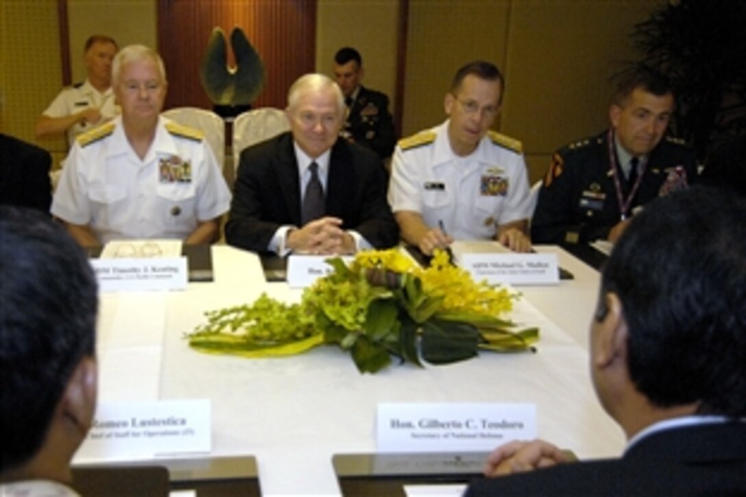 From left: U.S. Navy Adm. Timothy Keating, commander of U.S. Pacific Command, U.S. Defense Secretary Robert M. Gates, U.S. Navy Admiral Mike Mullen, chairman of the Joint Chiefs of Staff, and U.S. Army Lt. Gen. Peter Chiarelli, hold a bilateral meeting with Philippine Secretary of Defense Gilberto Teodoro Jr. and his staff during the 7th annual Asia Security Summit, the Shangri-La Dialogue in Singapore, May 31, 2008.  
