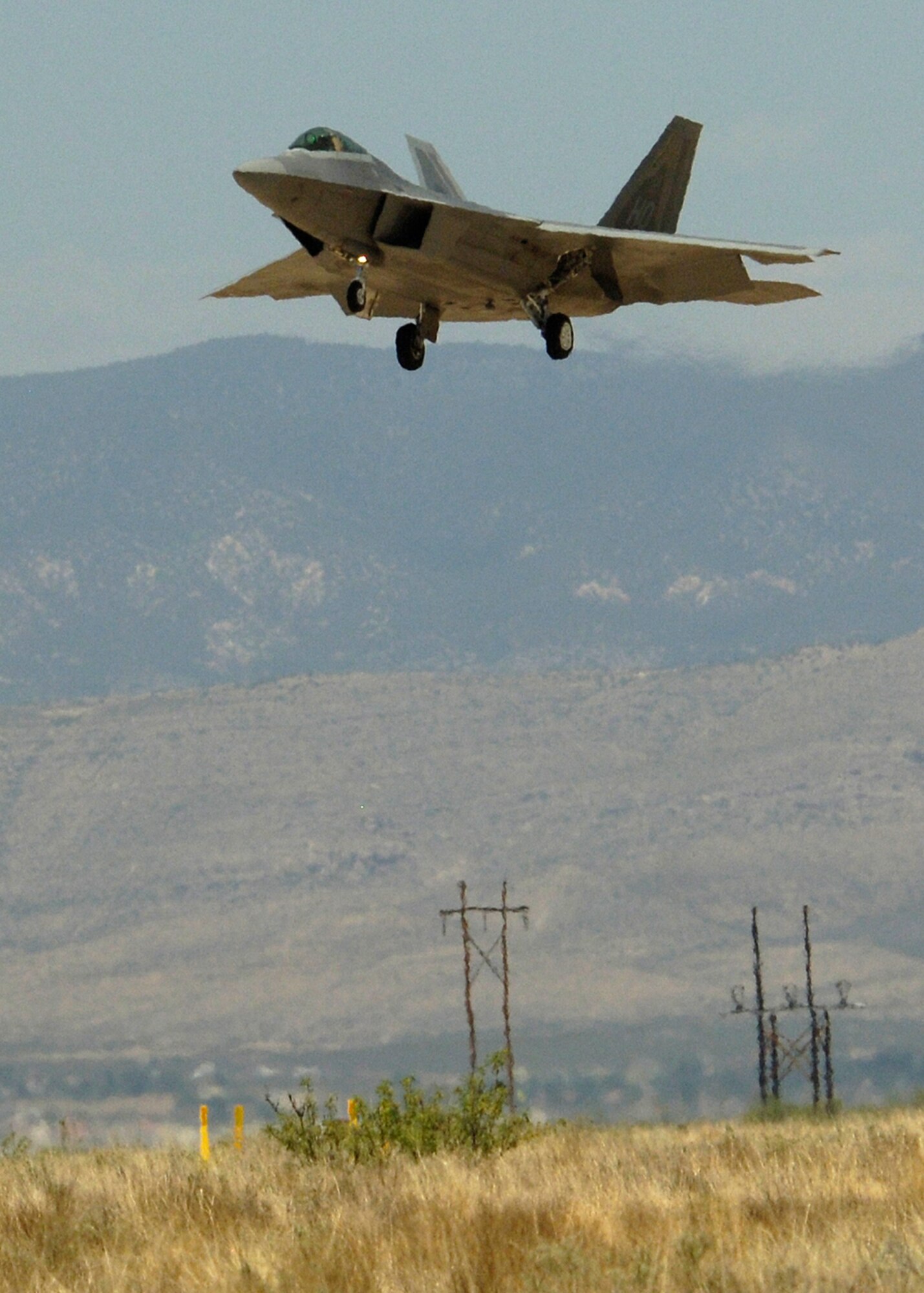 One of two F-22A Raptors land at Holloman Air Force Base, N.M., June 2. The jets flew over the Tularosa Basin prior to landing at Holloman giving the community a chance to witness the future of Holloman. (U.S. Air Force photo/Airman 1st Class Michael Means)