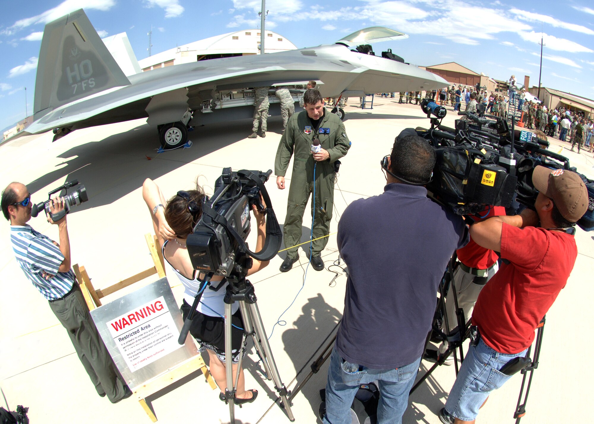 7th Fighter Squadron Commander Lt. Col. Mike "PigPen" Hernandez addresses the media about the F-22A Raptor on Holloman Air Force Base, N.M., June 2.  Holloman Air Force Base received its first two F-22A Raptors on June 2.  (U.S. Air Force photo/Airman 1st Class John Strong)           
