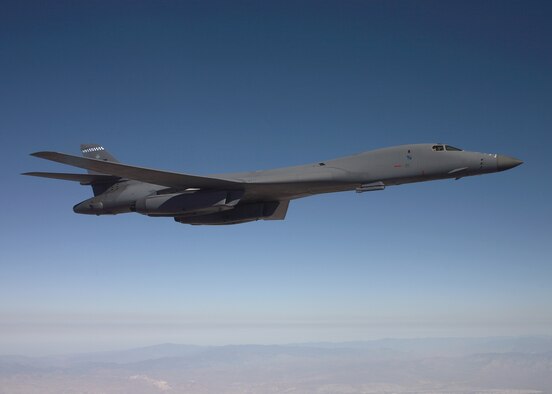 A B-1B Lancer carries a sniper pod while flying a test mission. The sniper pod is scheduled to be fully operational this summer. (Air Force photo by Jet Fabara) 