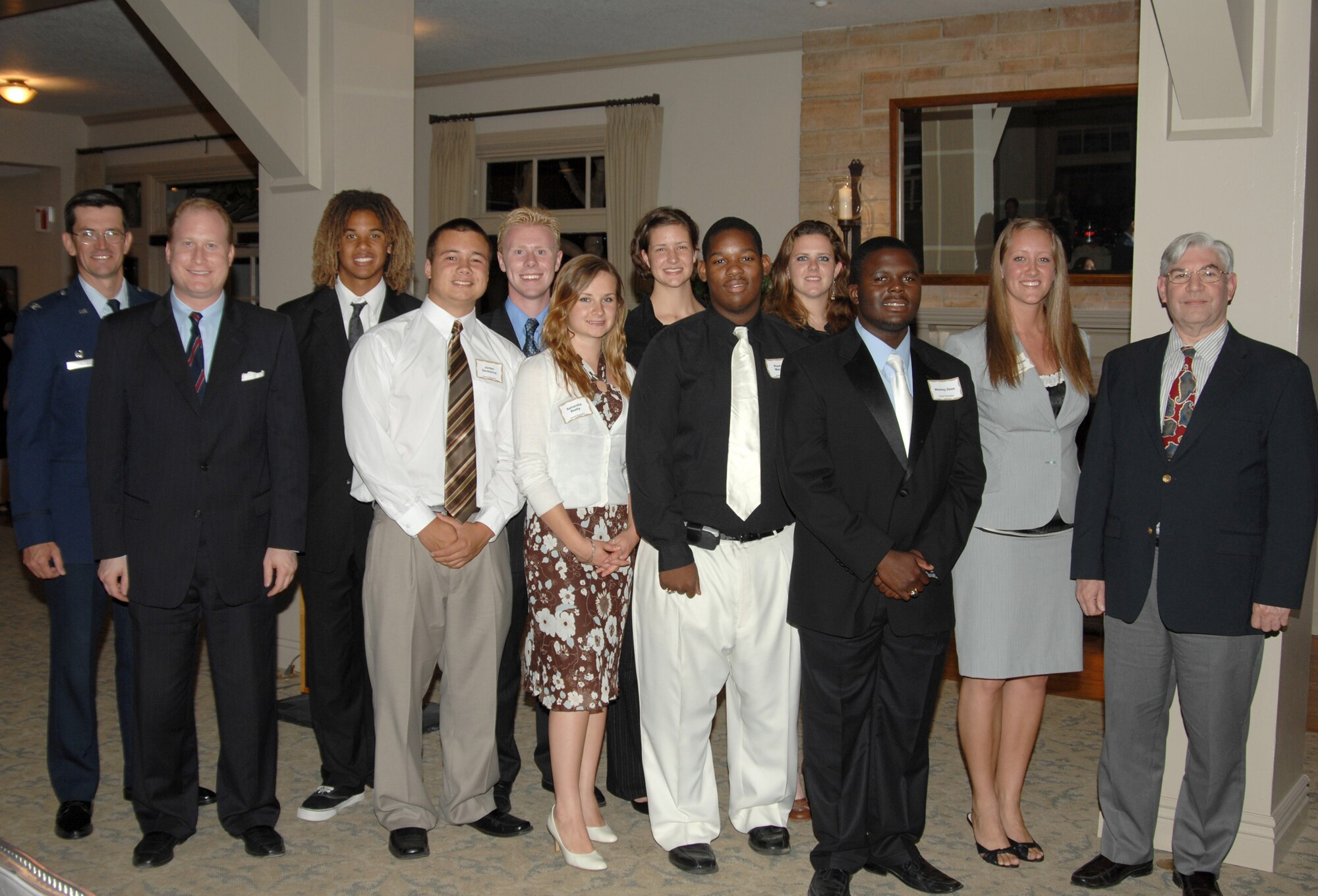 The Los Angeles Air Force Spouses' Club held its 2008 Scholarship Awards Reception May 22 at Fort MacArthur in San Pedro, Calif.  Twelve students received scholarships, totaling $22,000.  Two of the scholarships were made possible by the more than $6,000 that The Goldstein Family Foundation donated to the Spouses' Club. Pictured from left to right are Col. Joseph Schwarz, Joseph Goldstein, Kyle Robinson, Jordan Severance, Brett Teague, Samantha Beatty, Kelly McColl, Rashad Manning, Molly Roth, Wesley Dees, Shannon Miller and Retired Col Kirshbaum. Not pictured are: Daniel Killam, Lauren Foy, and Christina Hass. (Photo by Lou Hernandez)