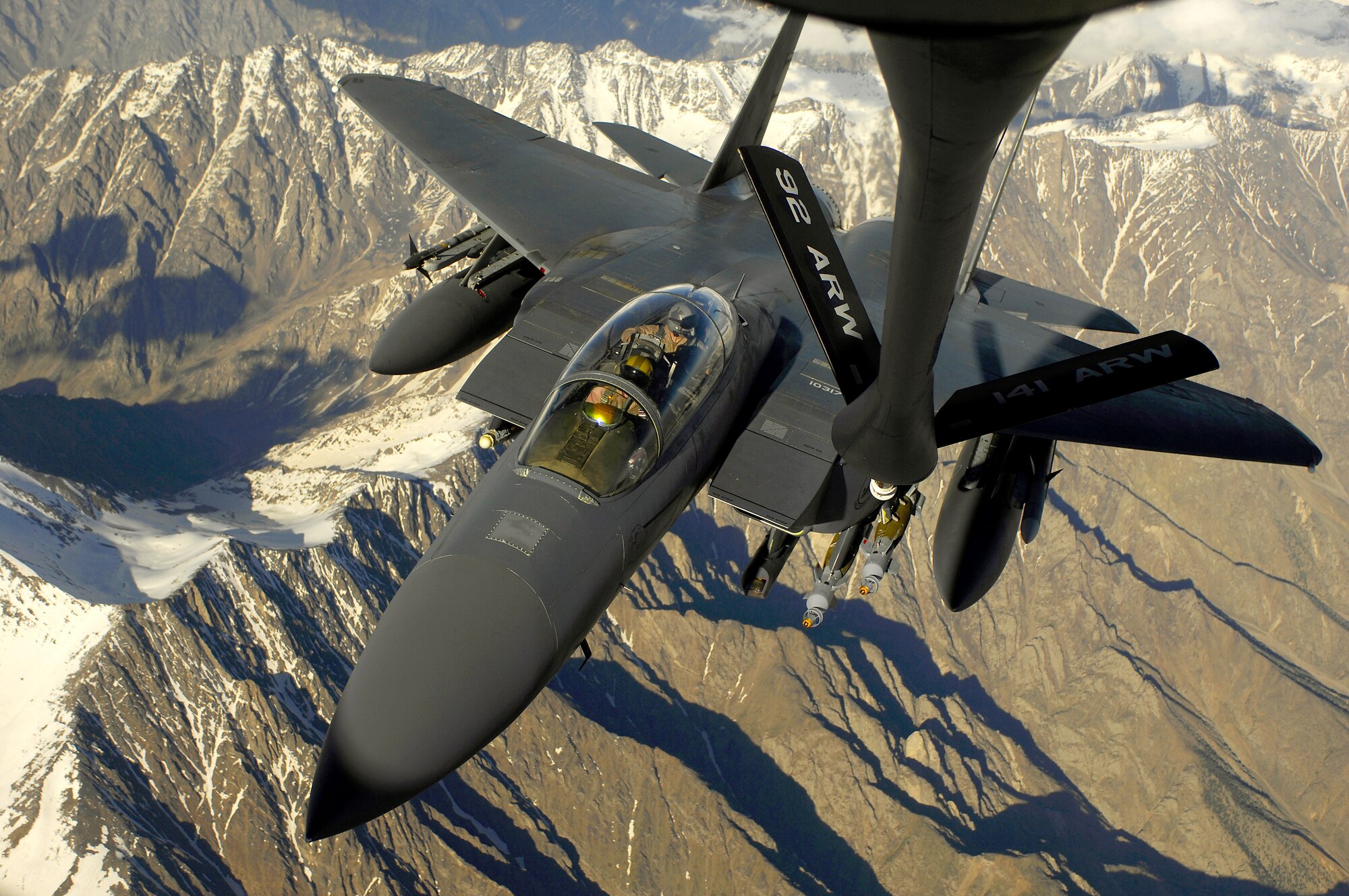 An Air Force F-15E Strike Eagle aircraft moves into position to receive fuel May 29, 2008 from a KC-135 Stratotanker during a mission over Afghanistan. The F-15E is deployed from Royal Air Force Lakenheath, U.K. and the KC-135 is assigned to the 22nd Expeditionary Air Refueling Squadron, 376th Air Expeditionary Wing Manas Air Base, Kyrgyzstan and is deployed from 141st Air Refueling Wing Fairchild Air Force Base, Wash. (U.S. Air Force photo/Master Sgt. Andy Dunaway) 