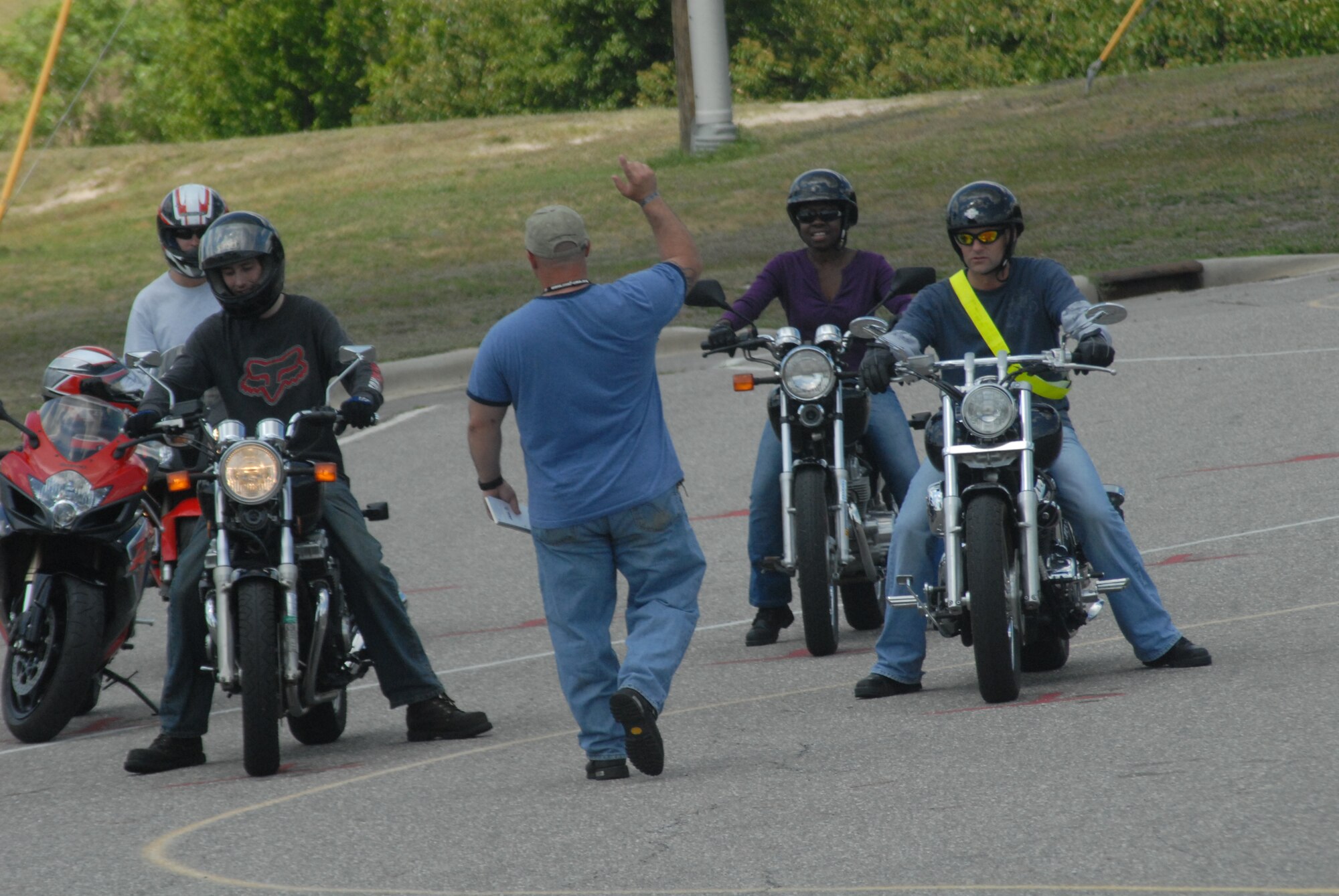 Army Master Sgt. Adam Bourlet, Motor Safety Foundation rider coach, teaches students the “do and don’ts” of motorcycle driving at the parking lot behind 43rd Security Forces Squadron’s building Monday. Motorcycle safety is one of the critical education points for the 101 Critical Days of Summer. (U.S. Air Force Photo by Airman 1st Class Mindy Bloem)