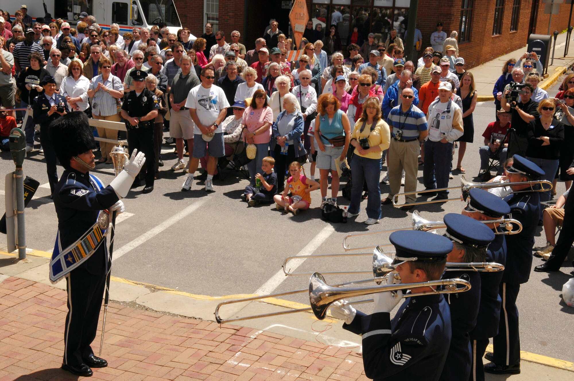 A crowd listens to the U.S. Air Force Band's Ceremonial Brass during the Jimmy Stewart Centenniel Celebration May 24 in Indiana, Pa. The famed actor and Air Force Reserve brigadier general was born in the town. (U.S. Air Force photo/Senior Airman Dan DeCook) 
