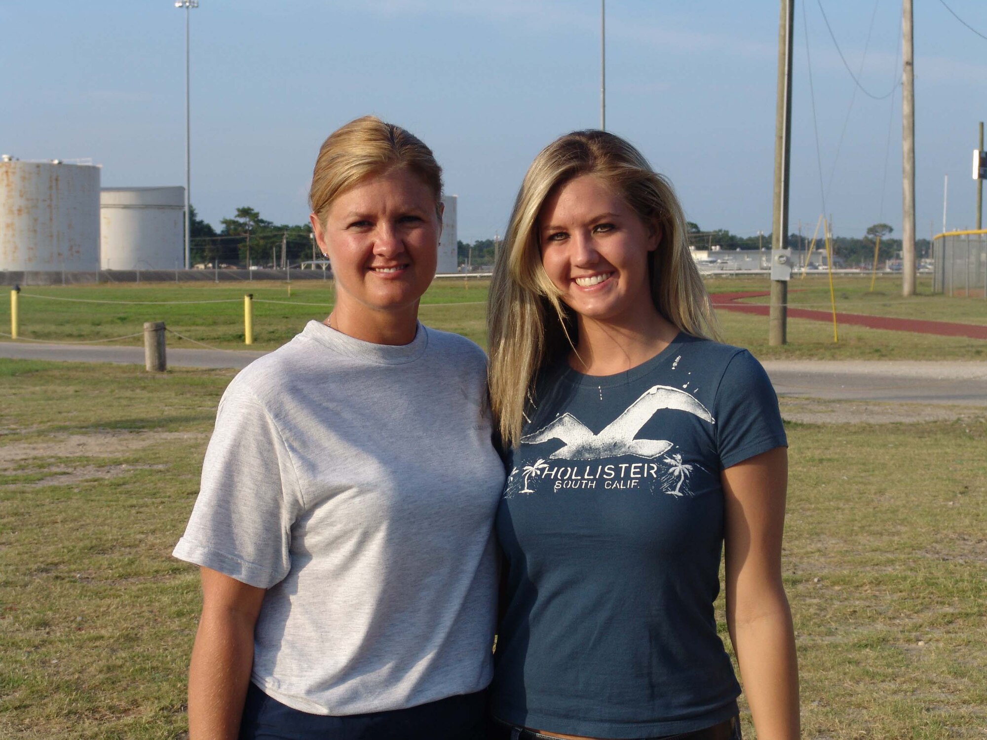 Tech Sgt. Shawna Meadows and her daughter, Airman First Class Jessica Meadows get a chance to visit the base where Sergeant Meadows is stationed. (USAF photo by Lois Walsh)