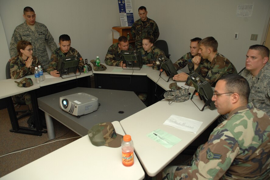 Students in the Integrated Maintenance Information Systems (IMIS) Course complete class work at Holloman Air Force Base, N.M. After this three-day course, students will be able to communicate with an F-22A Raptor through a computer system. (U.S. Air Force photo/Airman 1st Class Jamal D. Sutter)