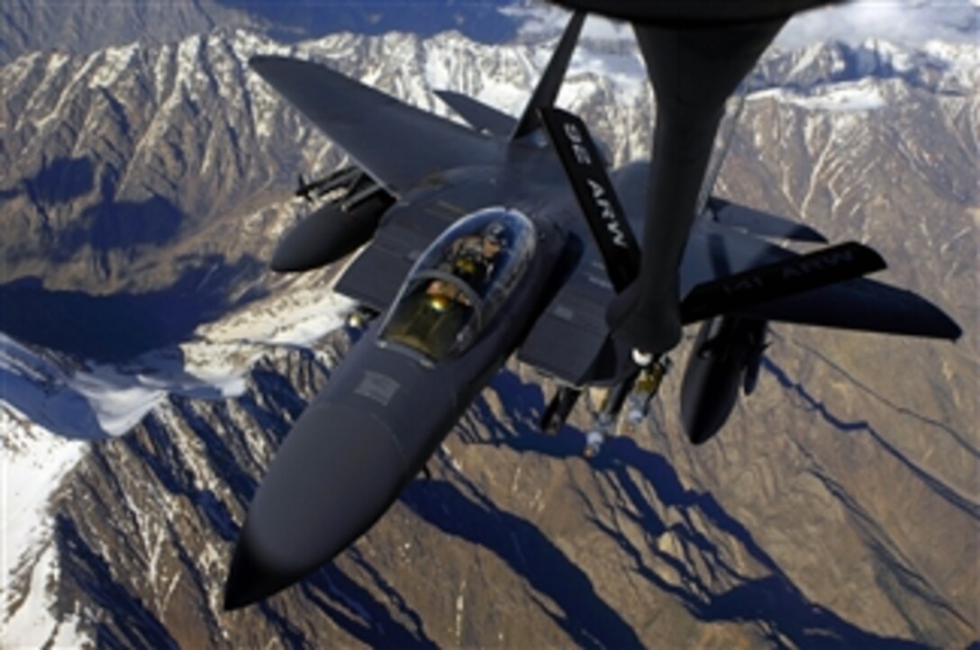 A U.S. Air Force F-15E Strike Eagle aircraft moves into position to receive fuel from a KC-135 Stratotanker aircraft during a mission over Afghanistan on May 29, 2008.  The F-15E is deployed from Royal Air Force Lakenheath, England, and the KC-135 is assigned to the 22nd Expeditionary Air Refueling Squadron, 376th Air Expeditionary Wing Manas Air Base, Kyrgyzstan, and is deployed from the 141st Air Refueling Wing Fairchild Air Force Base, Wash.  