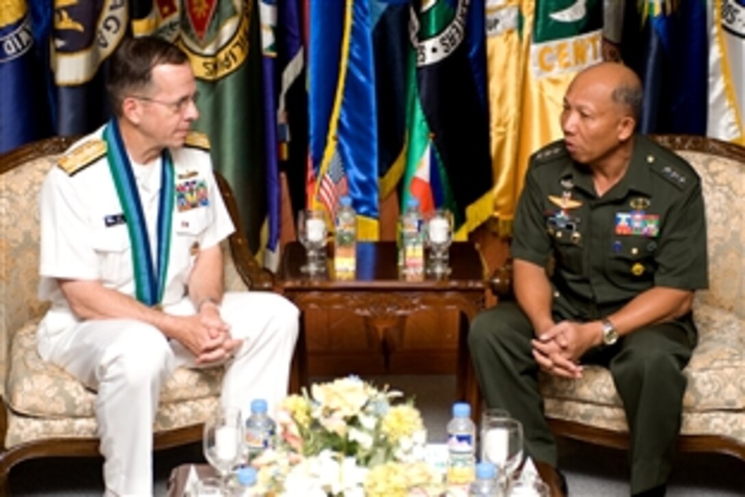 U.S. Navy Adm. Mike Mullen, chairman of the Joint Chiefs of Staff, speaks with Lt. Gen. Alexander M. Yano, chief of staff, Armed Forces of the Philippines, Manila, Republic of the Philippines, June 2, 2008.  Mullen is on an eight-day tour visiting Asian Pacific nations, their leaders and troops assigned to the region.  