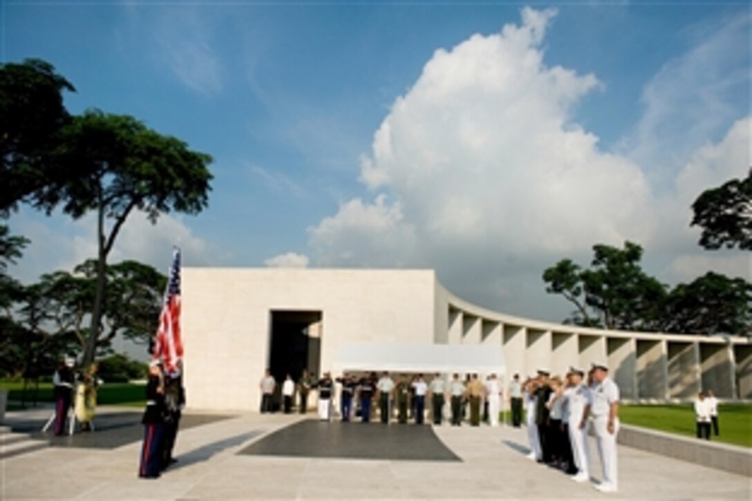 U.S. Navy Adm. Mike Mullen, chairman of the Joint Chiefs of Staff, honors the 17,202 troops who lost their lives in New Guinea and the Philippines during World War II and are buried in the Manila American Cemetery and Memorial, Republic of the Philippines, June 2, 2008. Mullen is on an eight-day tour visiting Asian Pacific nations, their leaders and troops assigned to the region.  