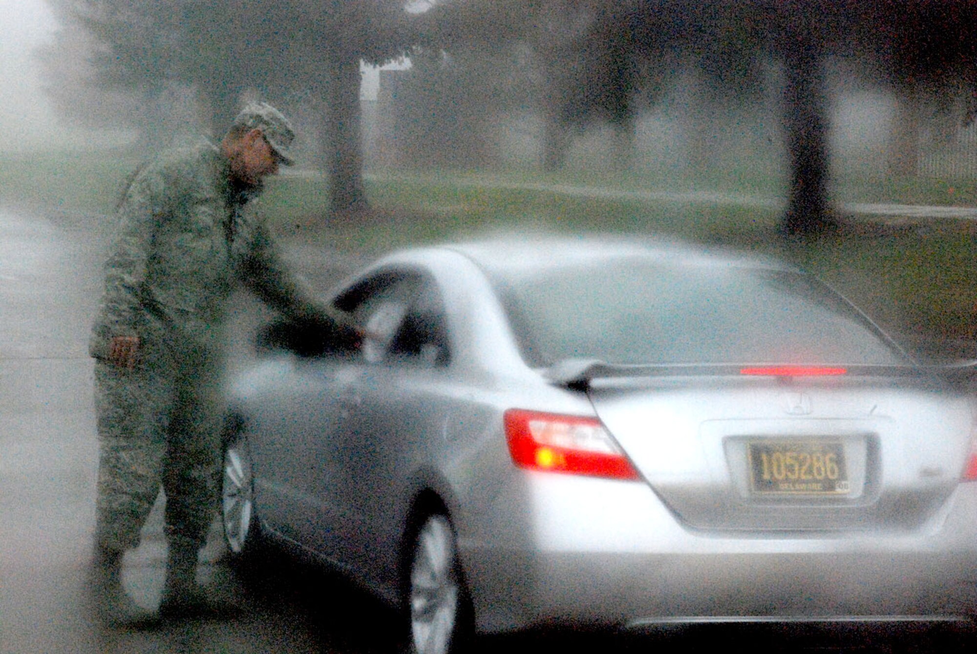 During bad weather, Col. Mike Morgan, 90th Space Wing commander, opened the 101 Critical Days of Summer May 22 at the front gate by wishing everyone a safe and happy weekend. He encouraged each of us to help one another have a safe and enjoyable summer (Photo by 2nd Lt. Brooke Brzozowske).