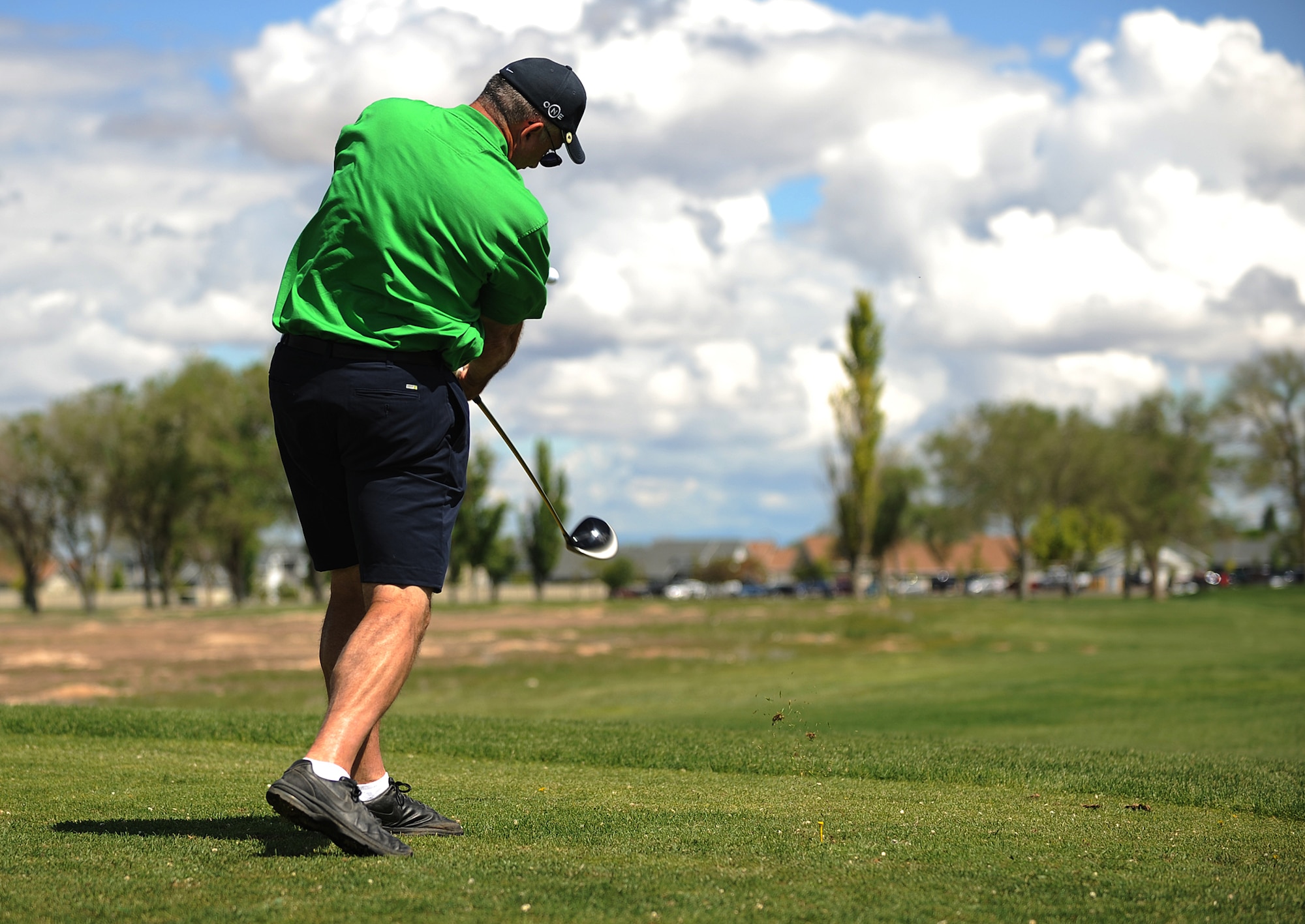 MOUNTAIN HOME AIR FORCE BASE, Idaho - Chief Master Sgt. Guy Sachette, 366th Equipment Maintenance Squadron, tees off during the Operation Warmheart Golf Tournament at Silver Sage Golf Course May 30. Operation Warmheart is a program run by the Mountain Home Air Force Base first sergeants to raise money in support of local Gunfighter families and other members of the local communities. Operation Warmheart also holds a softball tournament, a holiday food drive and numerous other fund raisers to support this community. (U.S. Air Force photo/ Airman 1st Class Ryan Crane)