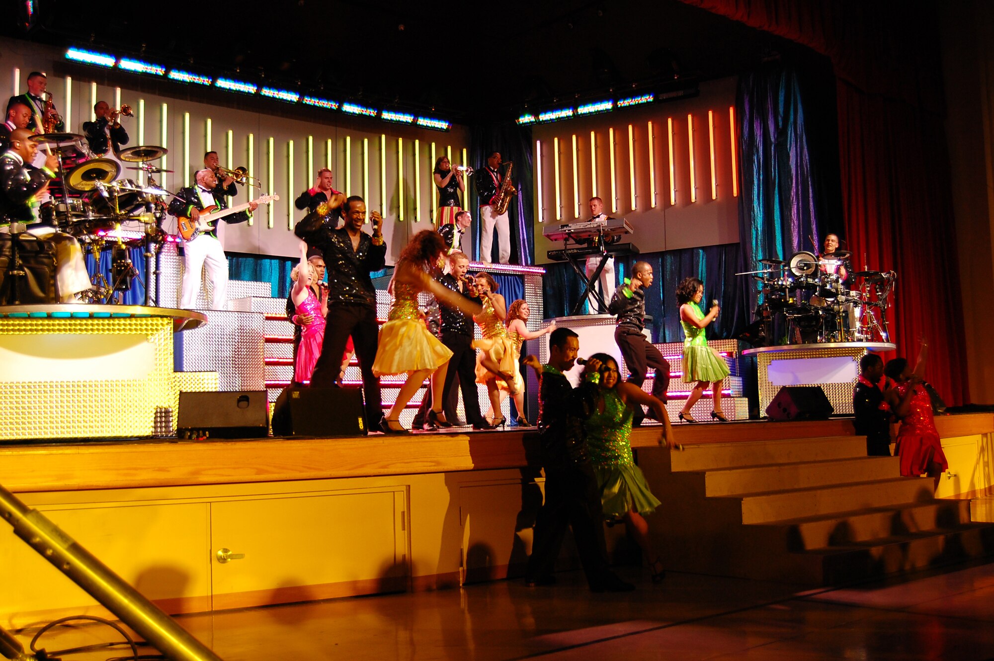 Members from Tops in Blue perform a dance number at the Tays Special Events Center on the University of New Mexico-Alamogordo campus, June 2. Tops in Blue showcases music, dance and comedy -- all performed by active-duty Airmen who perform non-stop live entertainment. (U.S. Air Force photo/Airman 1st Class Michael Means)
