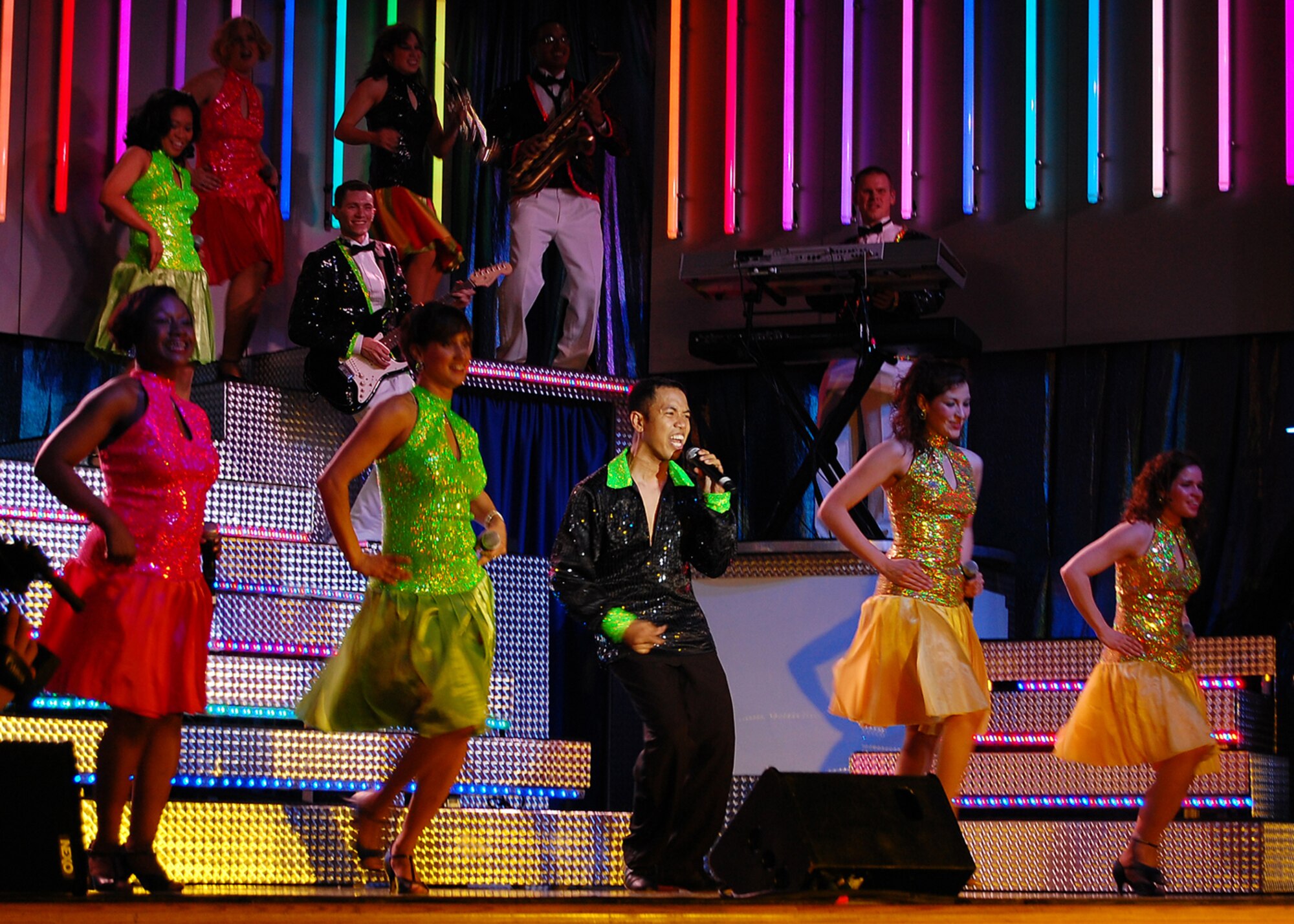 Members from Tops in Blue perform a dance number at the Tays Special Events Center on the University of New Mexico-Alamogordo campus, June 2. Tops in Blue showcases music, dance and comedy -- all performed by active-duty Airmen who perform non-stop live entertainment. (U.S. Air Force photo/Airman 1st Class Michael Means)