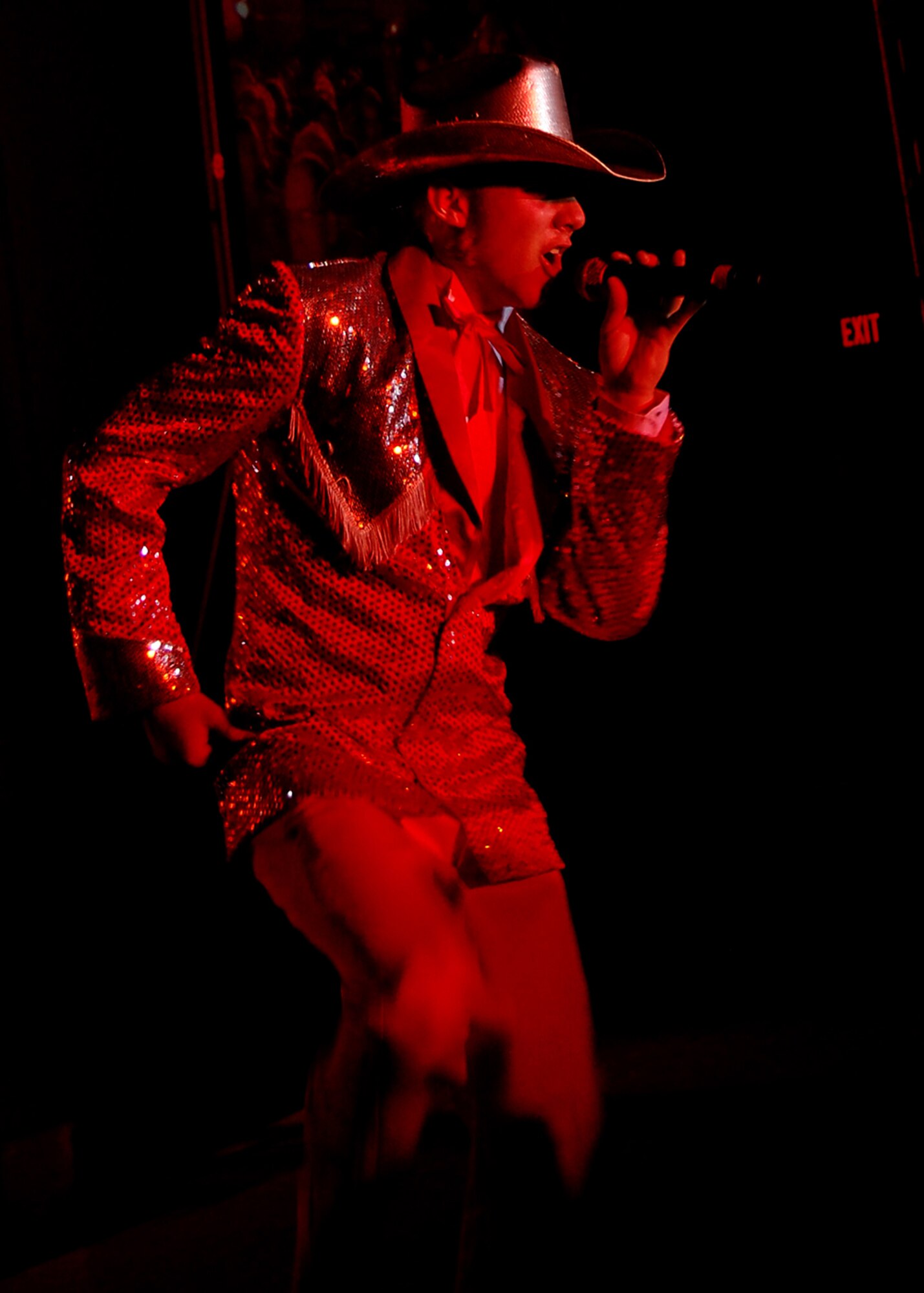 Airman 1st Class David Butler, Tops in Blue, performs at the Tays Special Events Center on the University of New Mexico-Alamogordo campus, June 2. Every year active-duty members from diverse career fields begin competing at the base level in talent shows for the chance to perform in Tops in Blue. (U.S. Air Force photo/Airman 1st Class Michael Means)
