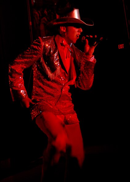 Airman 1st Class David Butler, Tops in Blue, performs at the Tays Special Events Center on the University of New Mexico-Alamogordo campus, June 2. Every year active-duty members from diverse career fields begin competing at the base level in talent shows for the chance to perform in Tops in Blue. (U.S. Air Force photo/Airman 1st Class Michael Means)