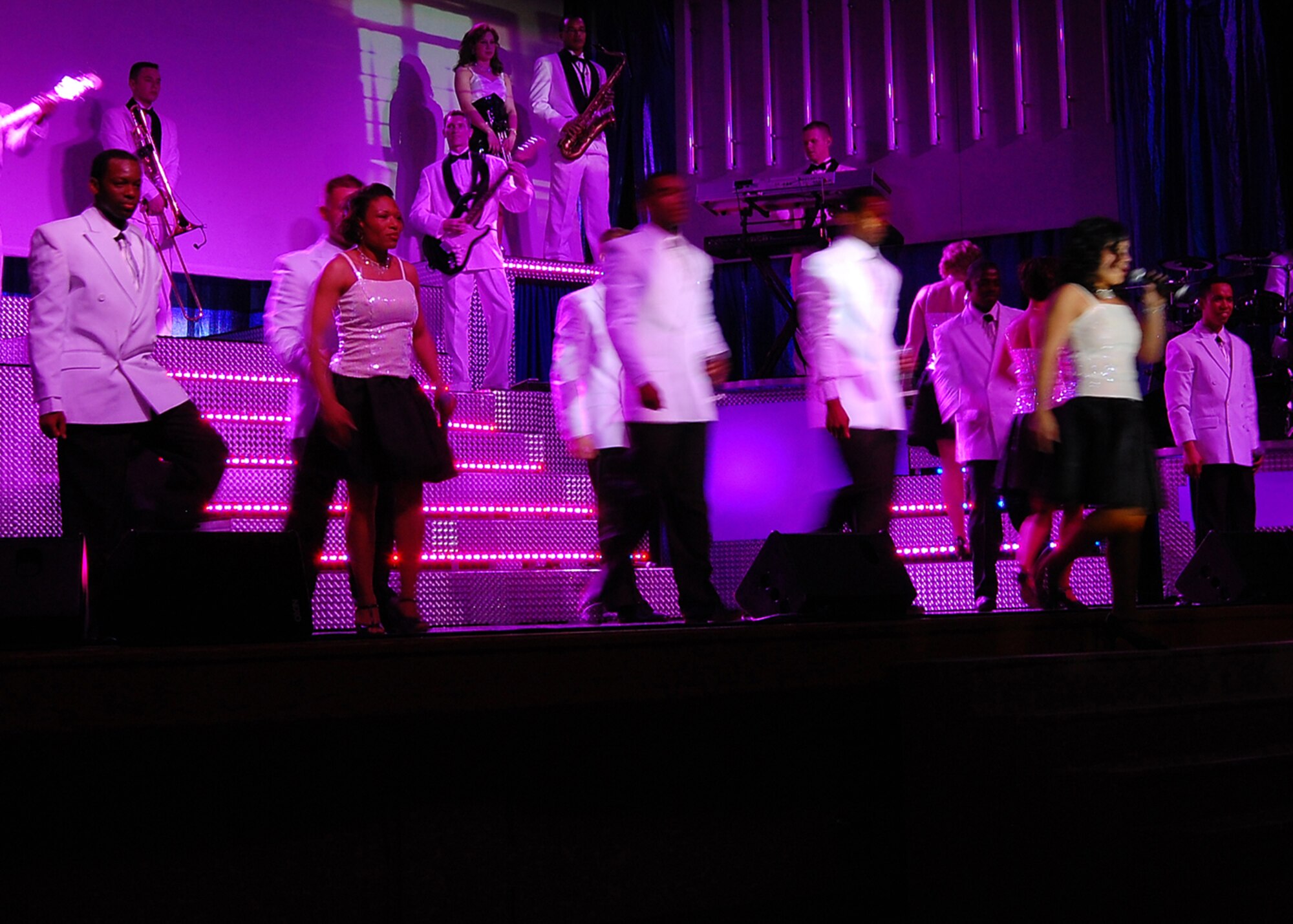 Members from Tops in Blue perform a dance number at the Tays Special Events Center on the University of New Mexico-Alamogordo campus, June 2. Tops in Blue showcases music, dance and comedy -- all performed by active-duty Airmen who perform non-stop live entertainment. (U.S. Air Force photo/Airman 1st Class Michael Means)