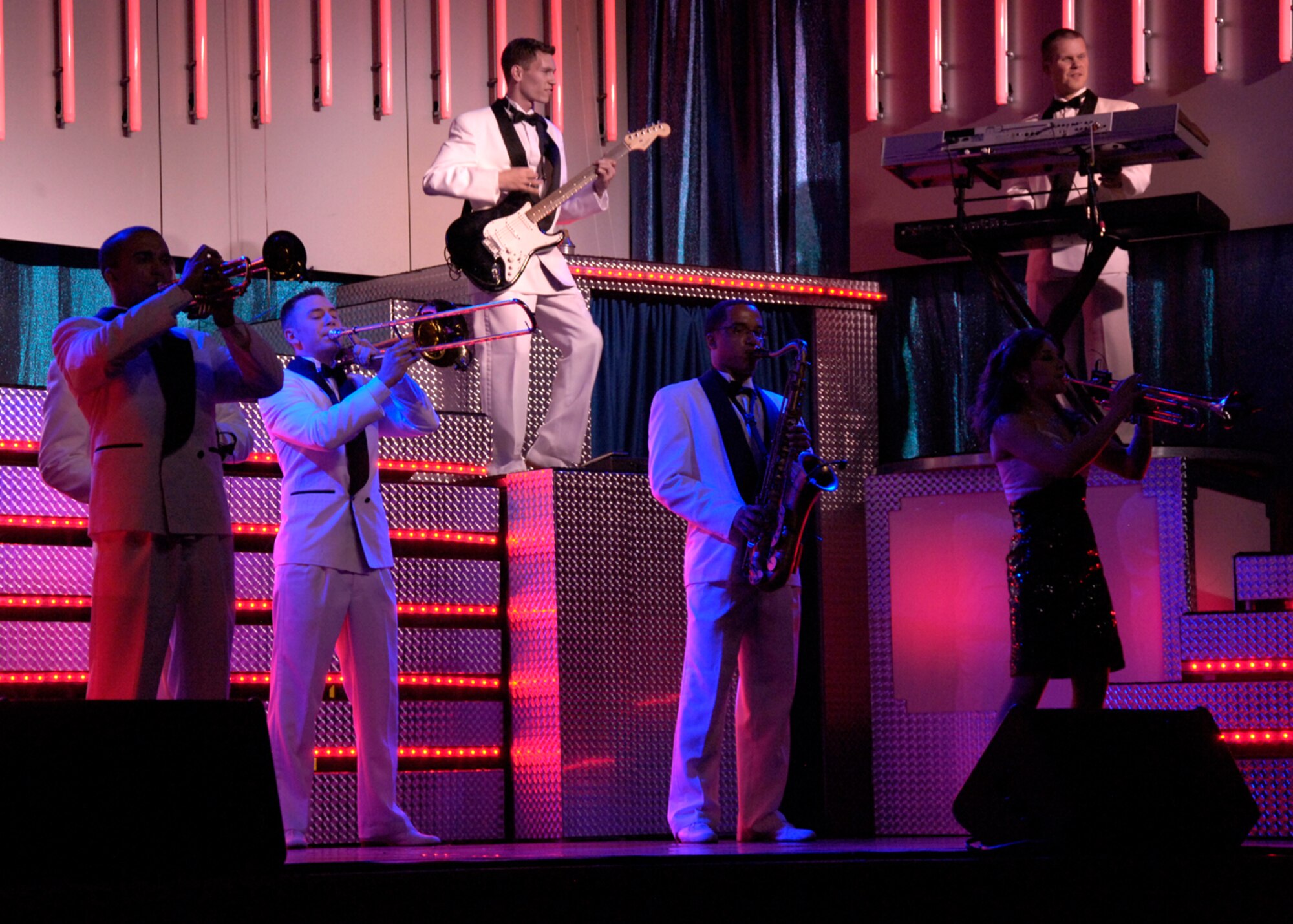 Members from Tops in Blue perform at the Tays Special Events Center on the University of New Mexico-Alamogordo campus, June 2. Tops in Blue showcases music, dance and comedy -- all performed by active-duty Airmen who perform non-stop live entertainment. (U.S. Air Force photo/Airman 1st Class Michael Means)